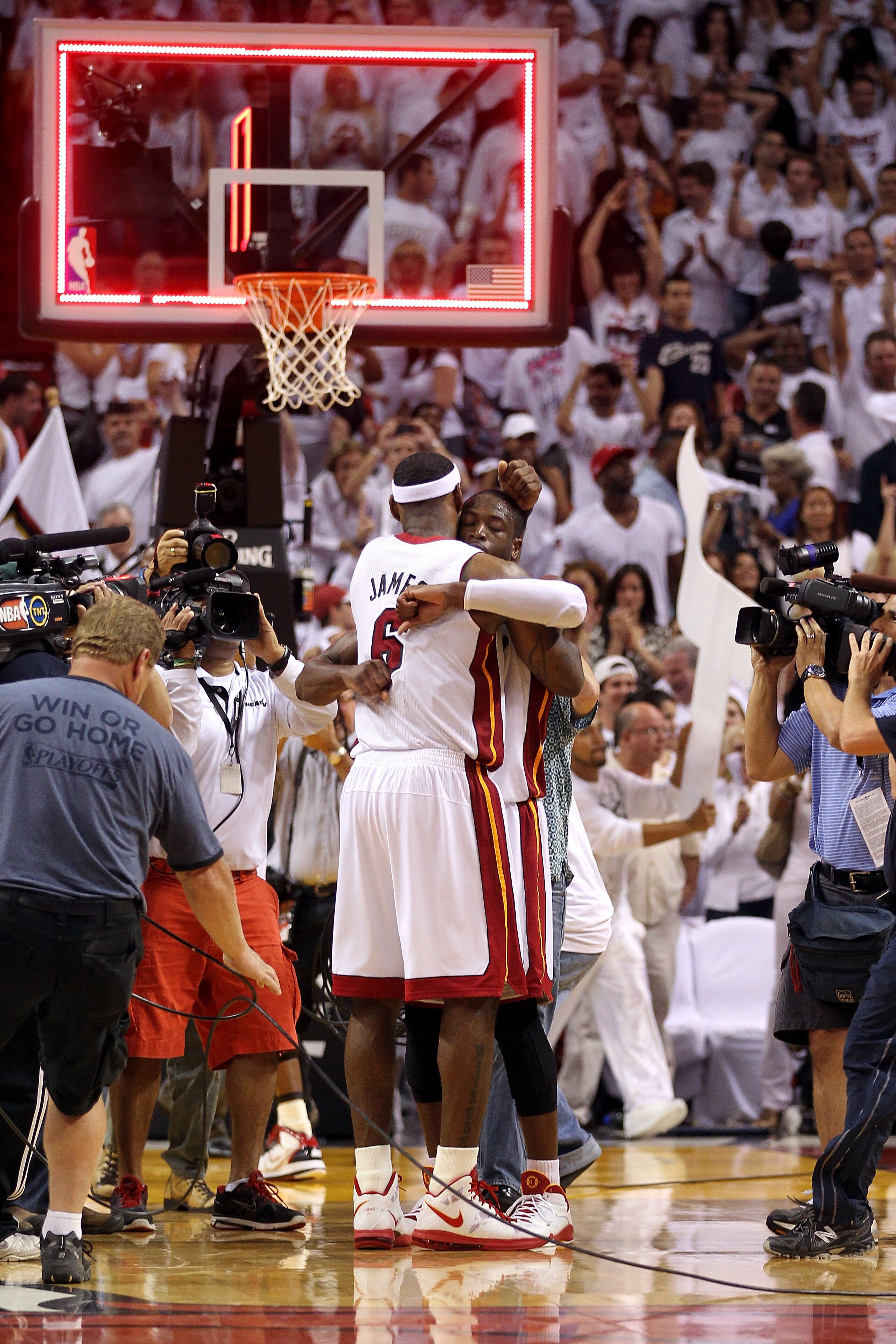 MIAMI, FL - MAY 24:  Dwyane Wade #3 and LeBron James #6 of the Miami Heat celebrate against the Chicago Bulls in Game Four of the Eastern Conference Finals during the 2011 NBA Playoffs on May 24, 2011 at American Airlines Arena in Miami, Florida. The Heat