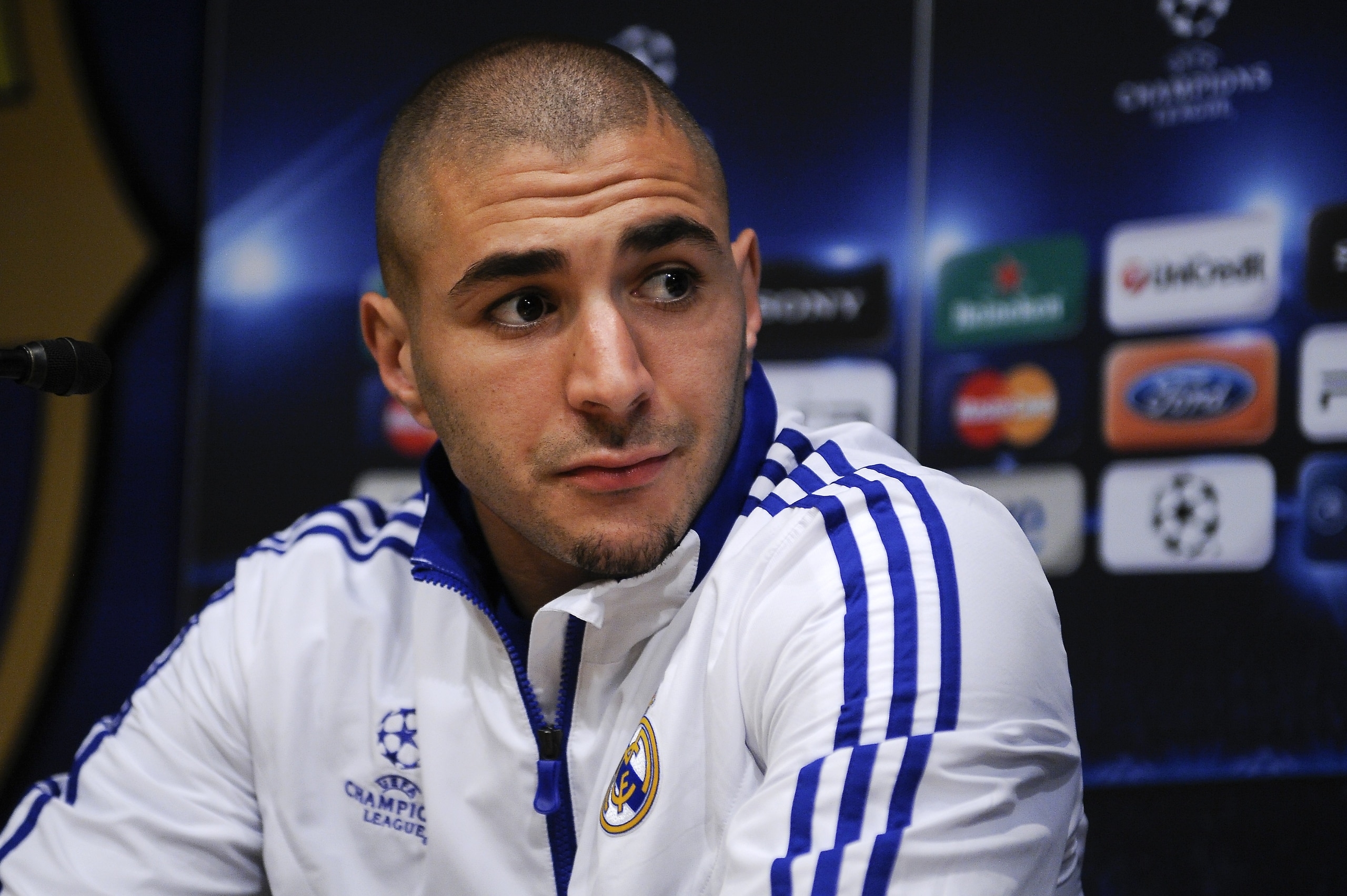 BARCELONA, SPAIN - MAY 02:  Karim Benzema of Real Madrid answers a question during a press conference at the Camp Nou Stadium, ahead of Barcelona's UEFA Champions League semi-final second leg match against Real Madrid, on May 2, 2011 in Barcelona, Spain.