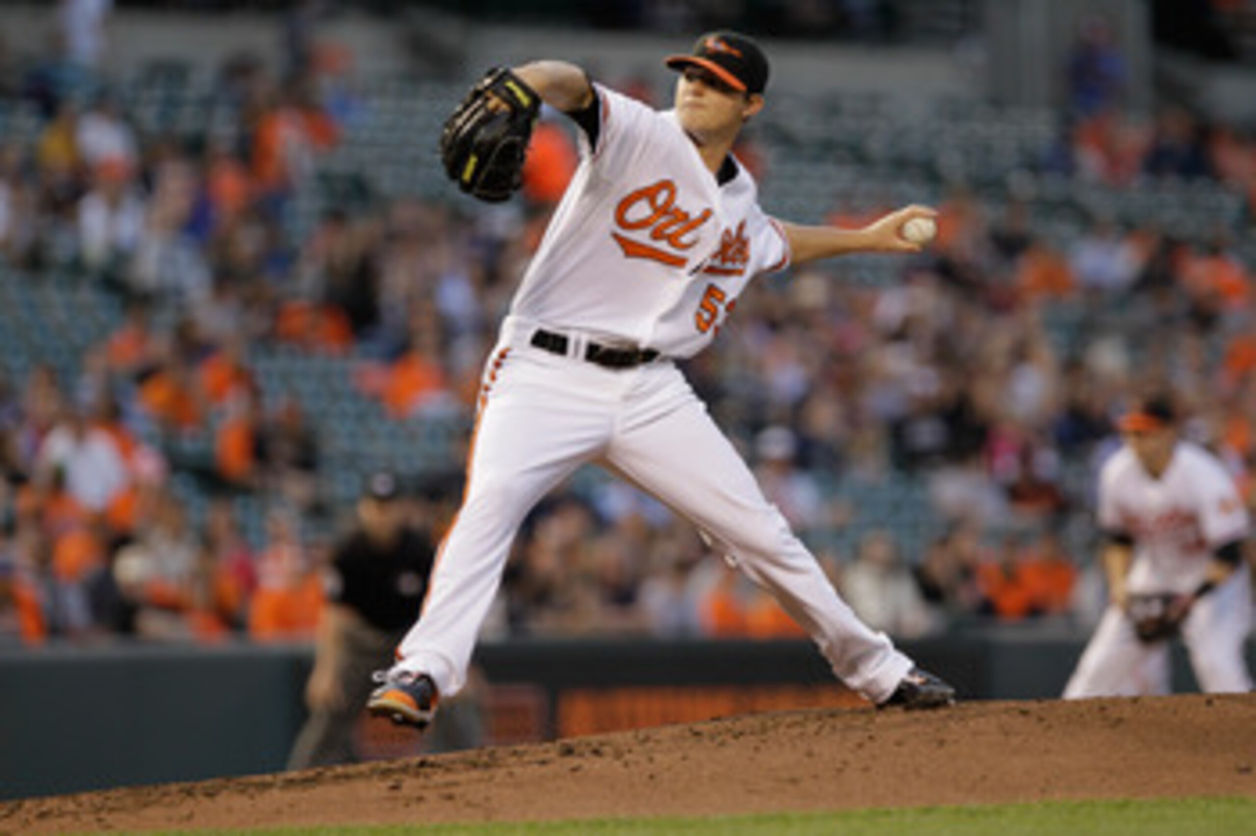 BALTIMORE, MD - MAY 12:  Starting pitcher Zach Britton #53 of the Baltimore Orioles delivers to a Seattle Mariners batter at Oriole Park at Camden Yards on May 12, 2011 in Baltimore, Maryland.  (Photo by Rob Carr/Getty Images)