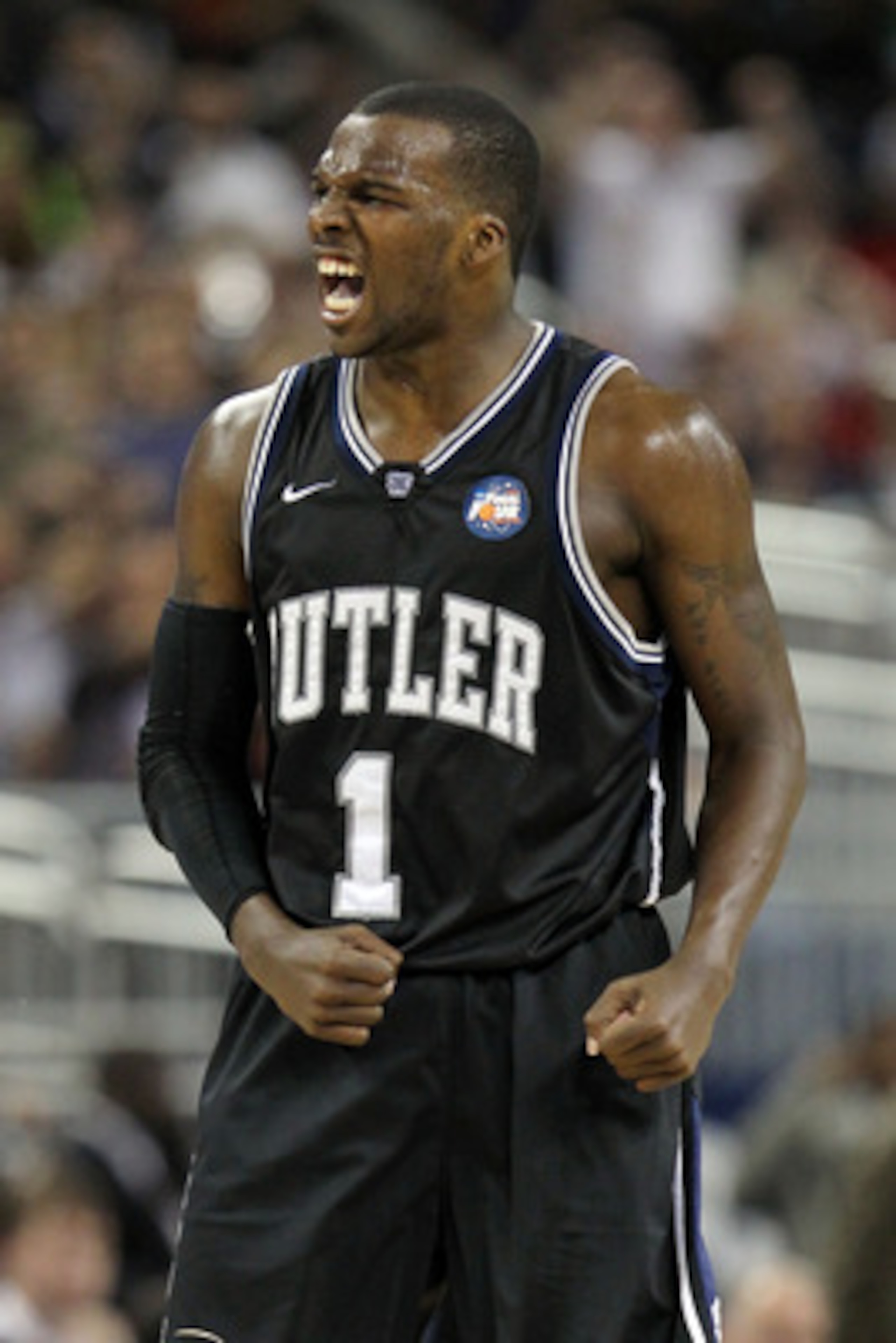 HOUSTON, TX - APRIL 04: Shelvin Mack #1 of the Butler Bulldogs celebrate after a shot to end the first half against the Connecticut Huskies during the National Championship Game of the 2011 NCAA Division I Men's Basketball Tournament at Reliant Stadium o HOUSTON, TX - APRIL 04: Shelvin Mack #1 of the Butler Bulldogs celebrate after a shot to end the first half against the Connecticut Huskies during the National Championship Game of the 2011 NCAA Division I Men's Basketball Tournament at Reliant Stadium o