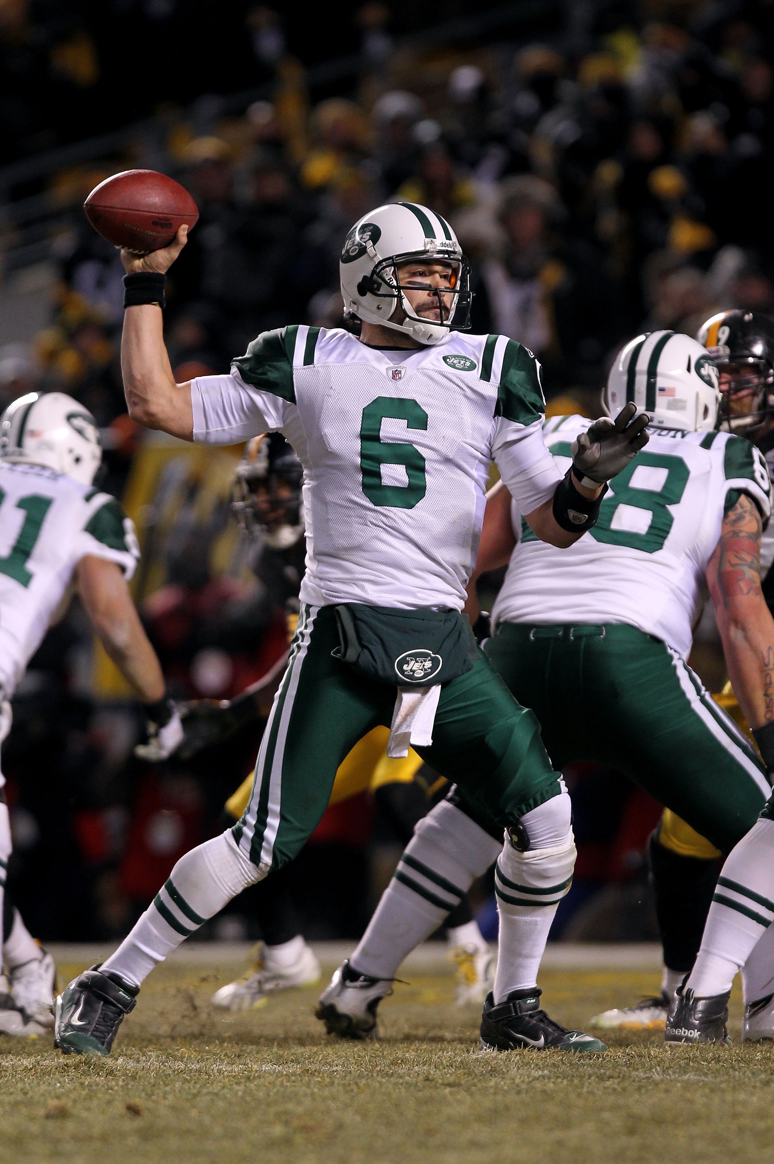 PITTSBURGH, PA - JANUARY 23:  Quarterback Mark Sanchez #6 of the New York Jets throws a pass against the Pittsburgh Steelers during the 2011 AFC Championship game at Heinz Field on January 23, 2011 in Pittsburgh, Pennsylvania. The Steelers won 24-19.  (Ph