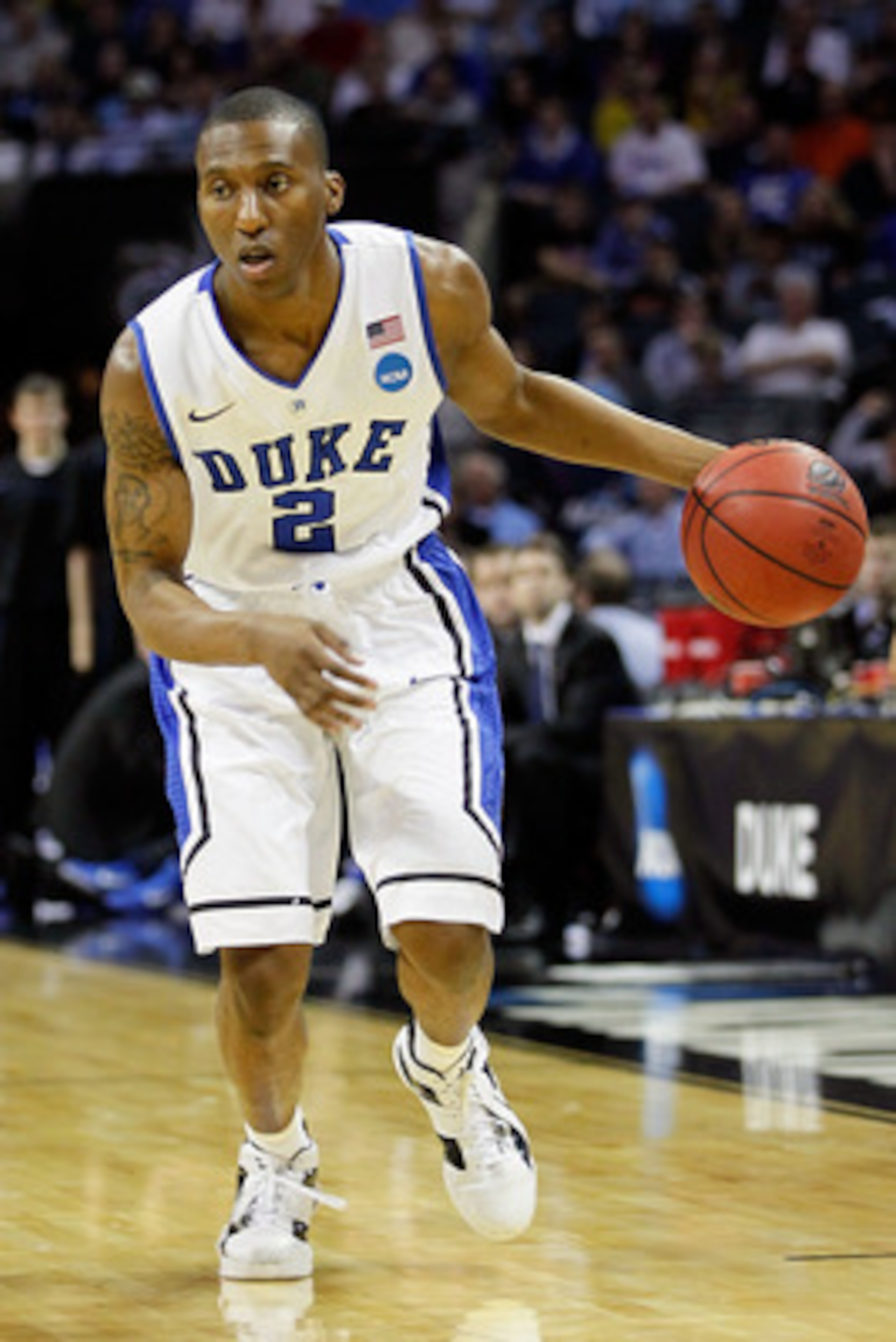 CHARLOTTE, NC - MARCH 20: Nolan Smith #2 of the Duke Blue Devils moves the ball while taking on the Michigan Wolverines during the third round of the 2011 NCAA men's basketball tournament at Time Warner Cable Arena on March 20, 2011 in Charlotte, North C CHARLOTTE, NC - MARCH 20: Nolan Smith #2 of the Duke Blue Devils moves the ball while taking on the Michigan Wolverines during the third round of the 2011 NCAA men's basketball tournament at Time Warner Cable Arena on March 20, 2011 in Charlotte, North C