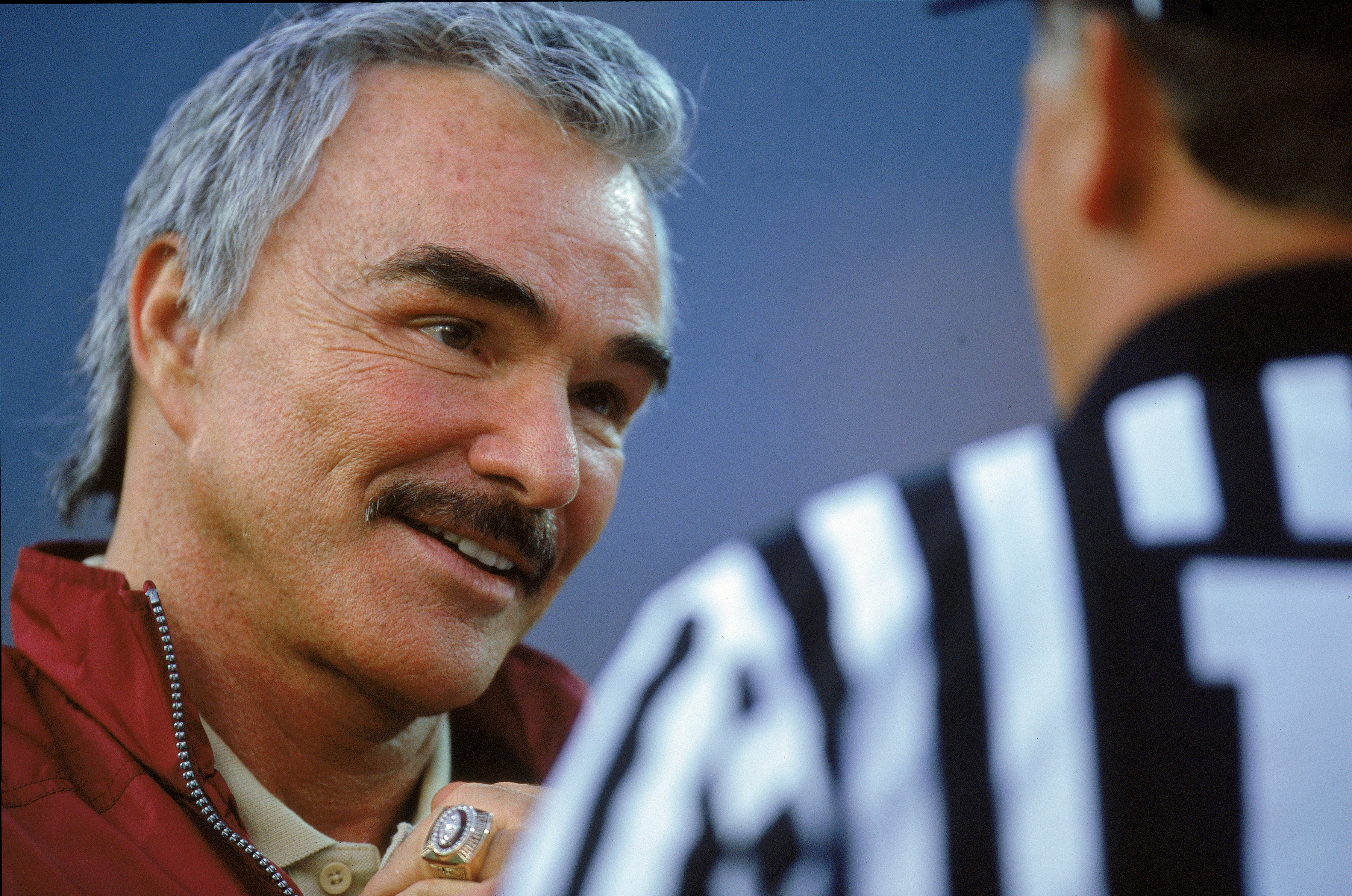 26 Aug 2000:  Actor Burt Reynolds talks to the referee during the Pigskin Classic Game between the Florida State Seminoles and the BYU Cougars at the Alltel Stadium in Jacksonville, Florida. The Seminoles defeated the Cougars 23-3.Mandatory Credit: Craig