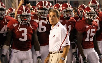 TUSCALOOSA, AL - OCTOBER 02:  Head coach Nick Saban of the Alabama Crimson Tide leads his team onto the field to face the Florida Gators at Bryant-Denny Stadium on October 2, 2010 in Tuscaloosa, Alabama.  (Photo by Kevin C. Cox/Getty Images)
