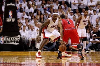 MIAMI, FL - MAY 24:  LeBron James #6 of the Miami Heat defends Derrick Rose #1 of the Chicago Bulls in Game Four of the Eastern Conference Finals during the 2011 NBA Playoffs on May 24, 2011 at American Airlines Arena in Miami, Florida. The Heat won 101-9