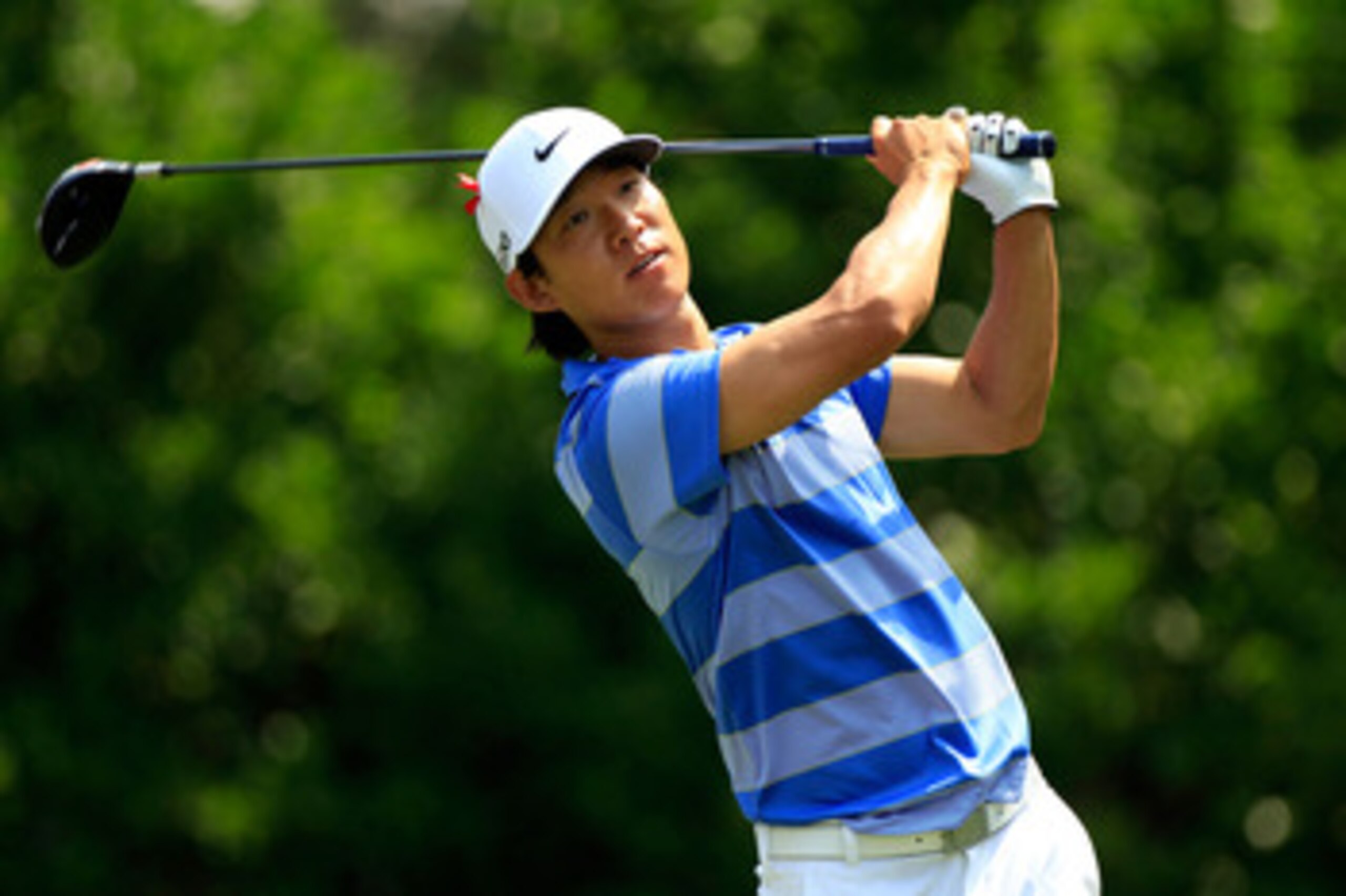 PONTE VEDRA BEACH, FL - MAY 13:  Anthony Kim hits his tee shot on the 11th hole during the second round of THE PLAYERS Championship held at THE PLAYERS Stadium course at TPC Sawgrass on May 13, 2011 in Ponte Vedra Beach, Florida.  (Photo by Sam Greenwood/