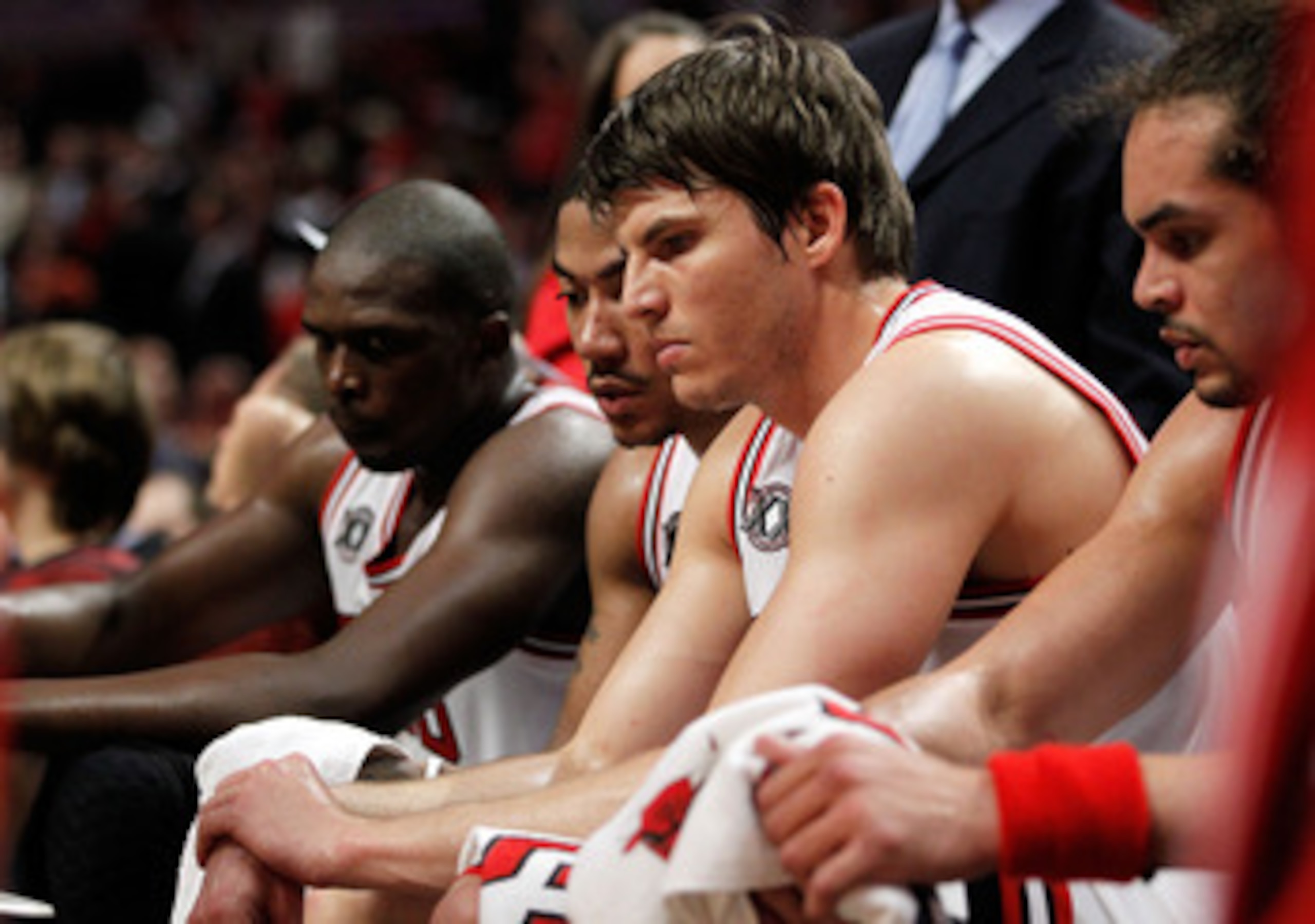 CHICAGO, IL - MAY 18:  (L-R) Luol Deng #9, Derrick Rose #1, Kyle Korver #26 and Joakim Noah #13 of the Chicago Bulls look on dejected from the bench late in the fourth quarter against the Miami Heat in Game Two of the Eastern Conference Finals during the