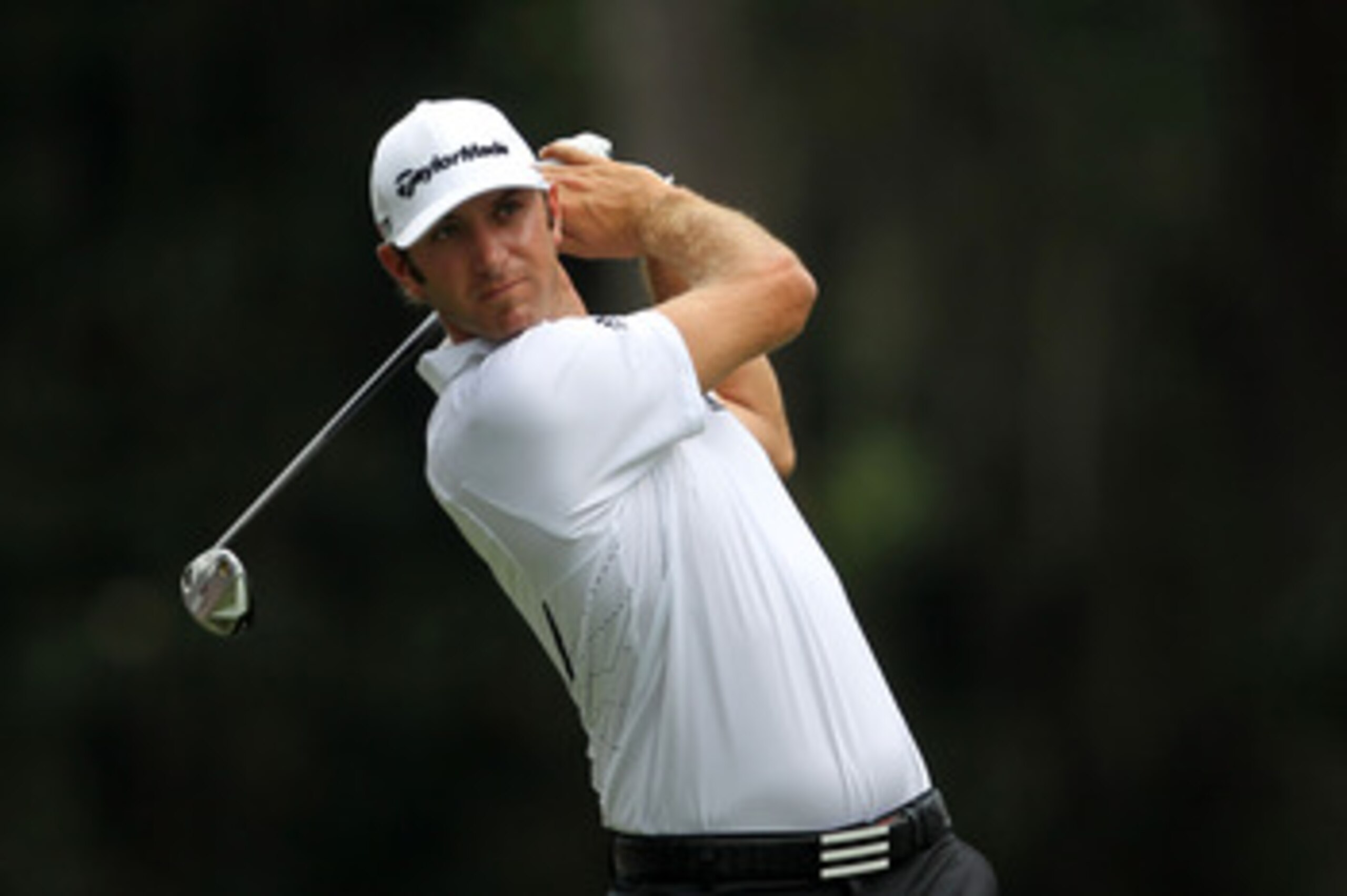 PONTE VEDRA BEACH, FL - MAY 14:  Dustin Johnson hits a tee shot on the sixth hole during the third round of THE PLAYERS Championship held at THE PLAYERS Stadium course at TPC Sawgrass on May 14, 2011 in Ponte Vedra Beach, Florida.  (Photo by Mike Ehrmann/