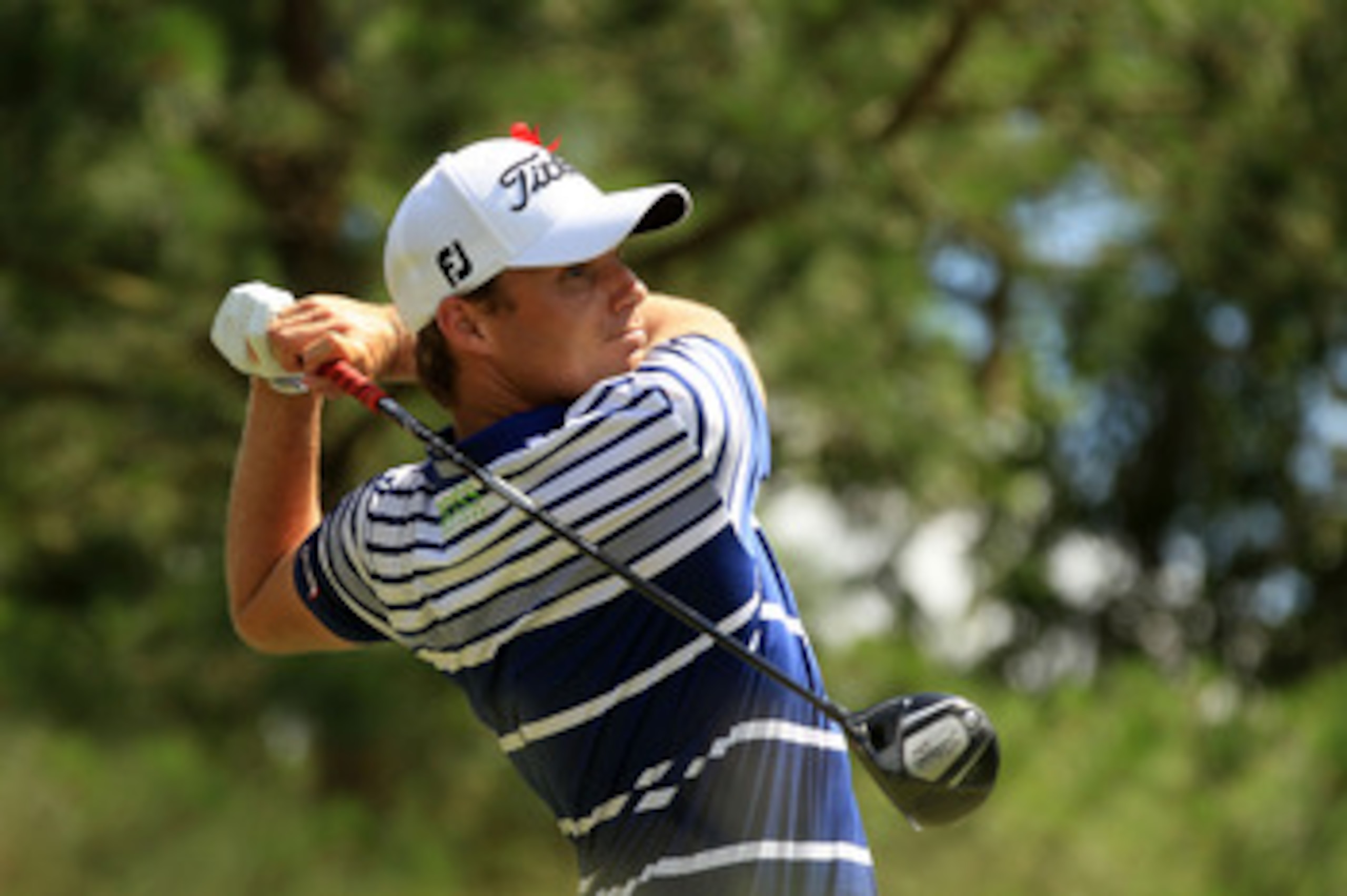 PONTE VEDRA BEACH, FL - MAY 15:  Nick Watney hits his tee shot on the seventh hole during the final round of THE PLAYERS Championship held at THE PLAYERS Stadium course at TPC Sawgrass on May 15, 2011 in Ponte Vedra Beach, Florida.  (Photo by Streeter Lec