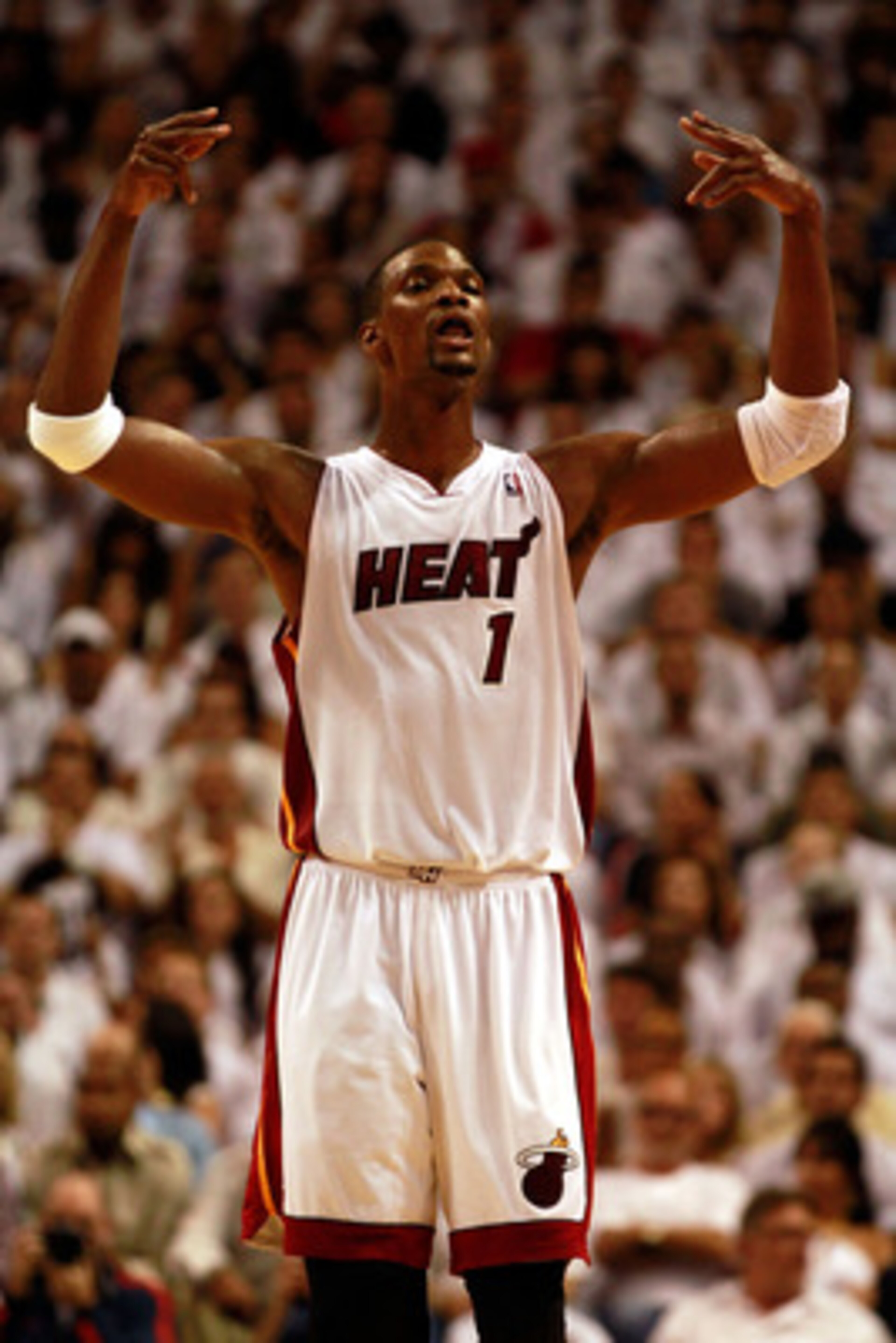 MIAMI, FL - MAY 24: Chris Bosh #1 of the Miami Heat reacts against the Chicago Bulls in Game Four of the Eastern Conference Finals during the 2011 NBA Playoffs on May 24, 2011 at American Airlines Arena in Miami, Florida. NOTE TO USER: User expressly ack MIAMI, FL - MAY 24: Chris Bosh #1 of the Miami Heat reacts against the Chicago Bulls in Game Four of the Eastern Conference Finals during the 2011 NBA Playoffs on May 24, 2011 at American Airlines Arena in Miami, Florida. NOTE TO USER: User expressly ack