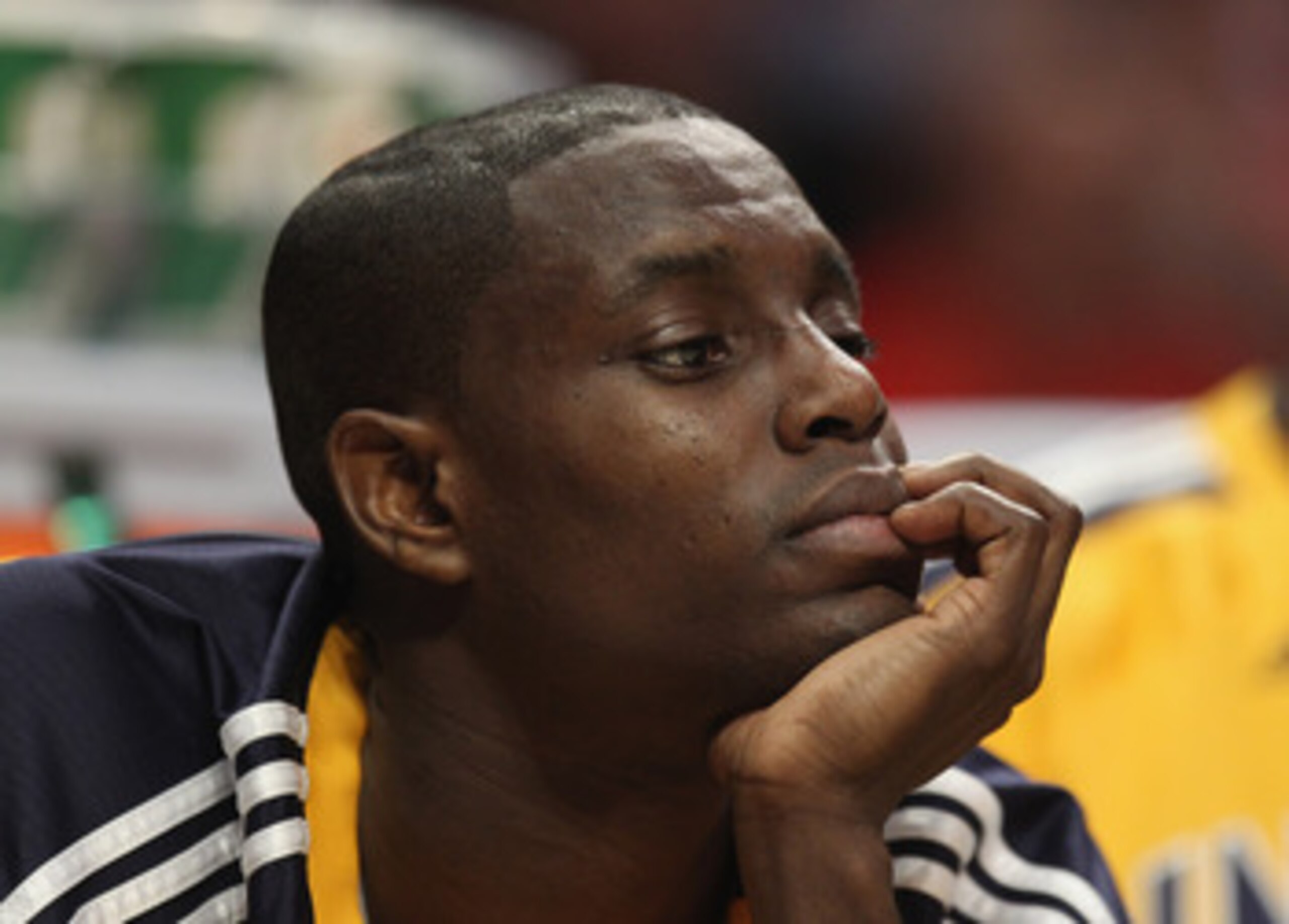 CHICAGO, IL - APRIL 26: Darren Collison #2 of the Indiana Pacers watches his teammates take on the Chicago Bulls from the bench in Game Five of the Eastern Conference Quarterfinals in the 2011 NBA Playoffs at the United Center on April 26, 2011 in Chicago