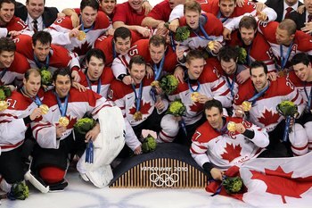 VANCOUVER, BC - FEBRUARY 28:  Team Canada poses for a team photo with their gold medals after winning the ice hockey men's gold medal game between USA and Canada on day 17 of the Vancouver 2010 Winter Olympics at Canada Hockey Place on February 28, 2010 i