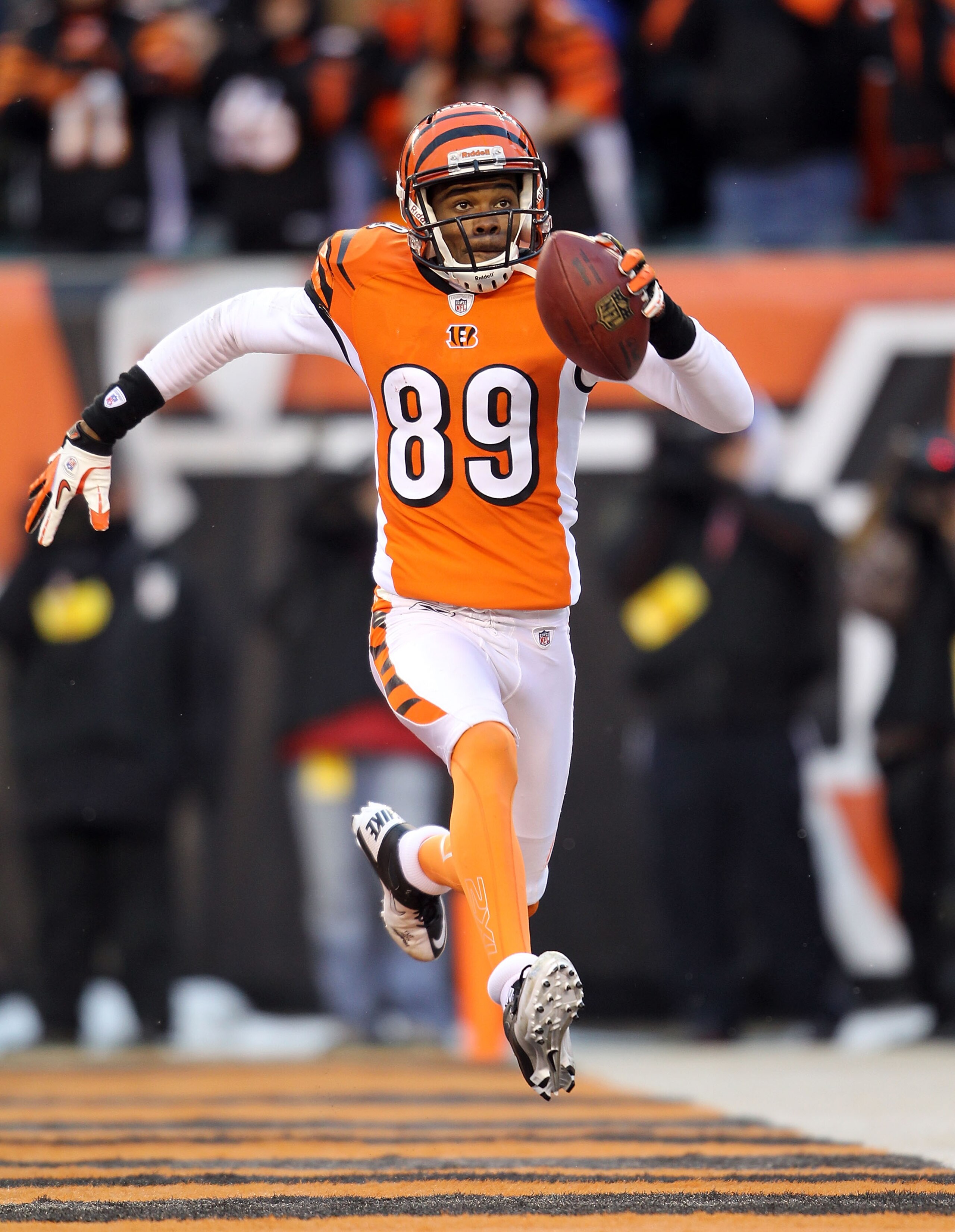 CINCINNATI - DECEMBER 26:  Jerome Simpson #89 of the Cincinnati Bengals celebrates after catching a touchdown pass during the NFL game against the San Diego Chargers at Paul Brown Stadium on December 26, 2010 in Cincinnati, Ohio. The Bengals 34-20.  (Phot