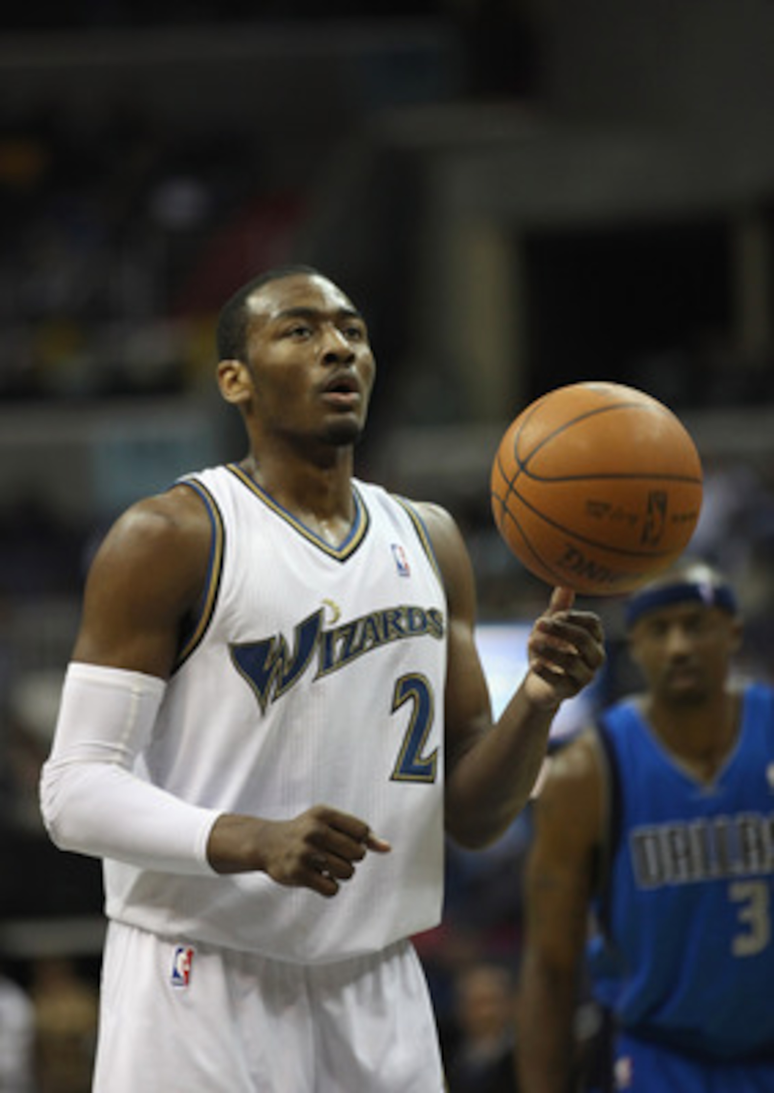 WASHINGTON, DC - FEBRUARY 26: John Wall #2 of the Washington Wizards against the Dallas Mavericksat the Verizon Center on February 26, 2011 in Washington, DC. NOTE TO USER: User expressly acknowledges and agrees that, by downloading and or using this Phot