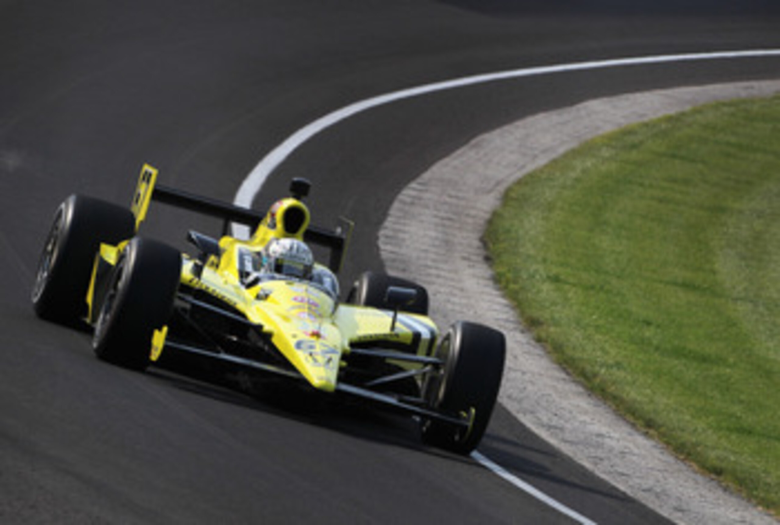 INDIANAPOLIS, IN - MAY 20:  Ed Carpenter, driver of the #67 Dollar General/Sarah Fisher Racing Dallara Honda, in action during practice for the Indianapolis 500 on May 20, 2011 at Indianapolis Motor Speedway in Indianapolis, Indiana.  (Photo by Jamie Squi