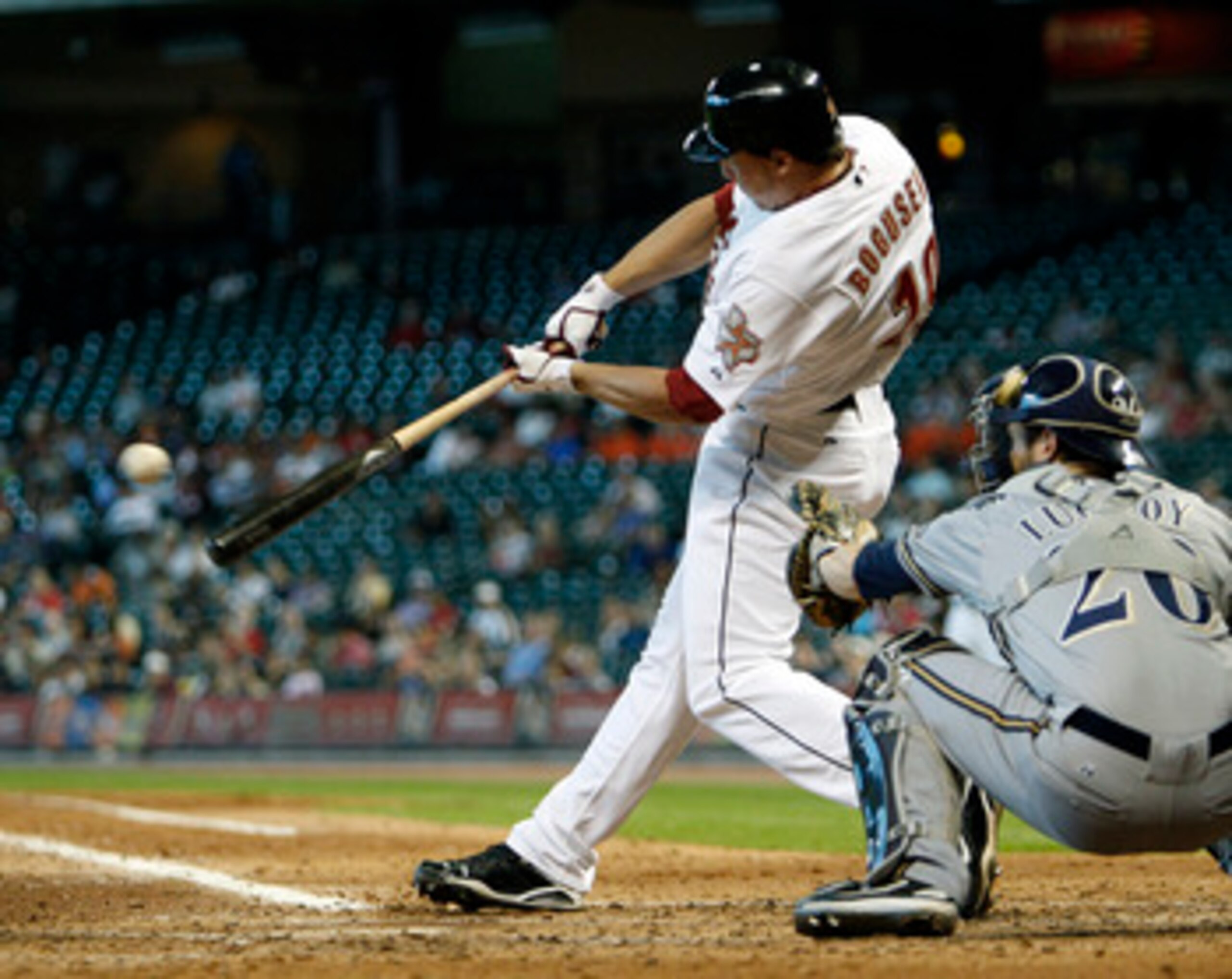 HOUSTON - SEPTEMBER 15: Brian Bogusevic #19 of the Houston Astros singles in the fifth inning knocking in two runs against the Milwaukee Brewers on September 15, 2010 in Houston, Texas. (Photo by Bob Levey/Getty Images) HOUSTON - SEPTEMBER 15: Brian Bogusevic #19 of the Houston Astros singles in the fifth inning knocking in two runs against the Milwaukee Brewers on September 15, 2010 in Houston, Texas. (Photo by Bob Levey/Getty Images)