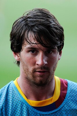 BARCELONA, SPAIN - MAY 23:  Lionel Messi of FC Barcelona looks on during the FC Barcelona training session held ahead of next Saturday's UEFA Champions League Final at the Camp Nou Stadium on May 23, 2011 in Barcelona, Spain.  (Photo by David Ramos/Getty 