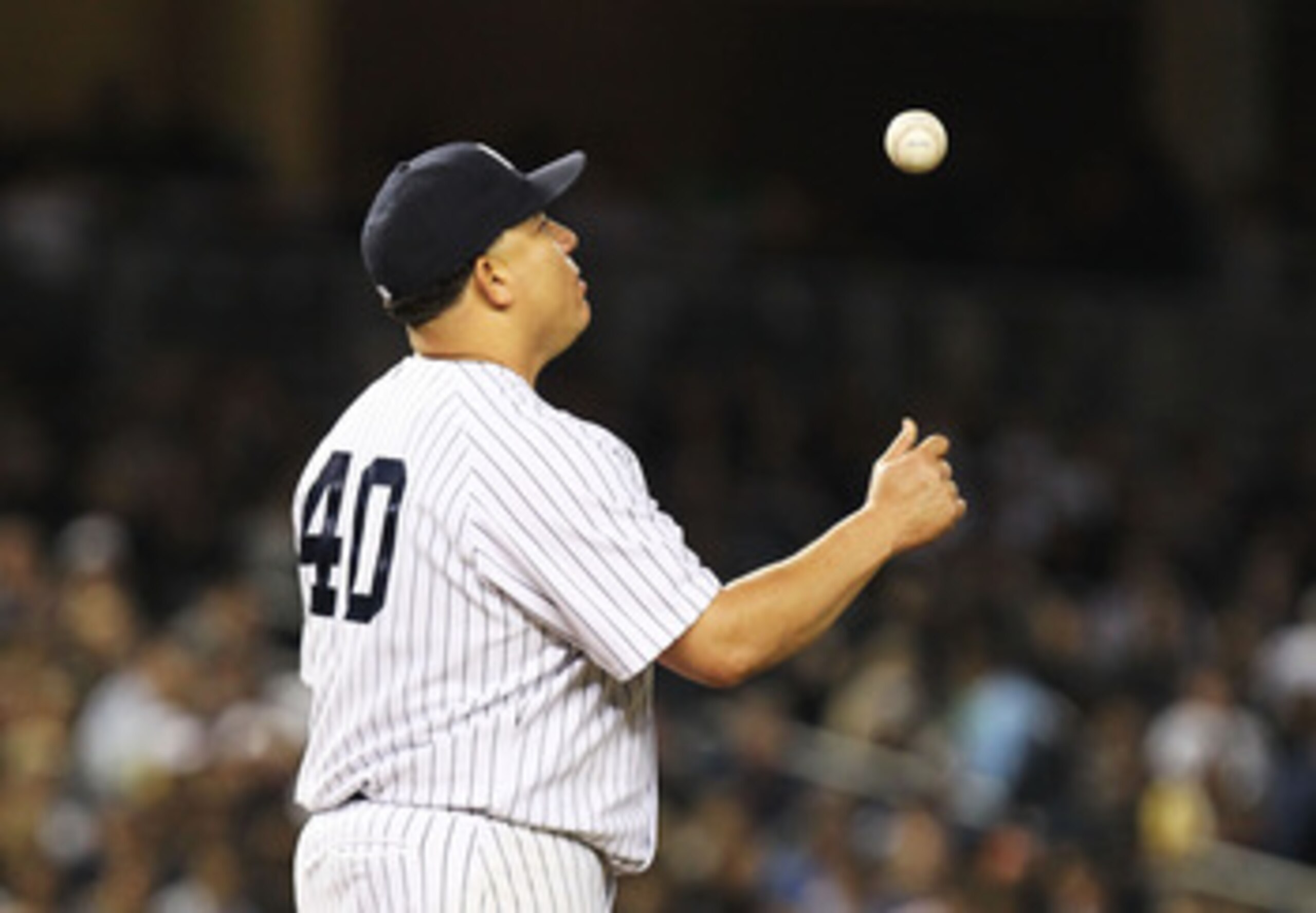 NEW YORK, NY - MAY 13:  Bartolo Colon #40 of the New York Yankees reacts after giving up two runs by the Boston red Sox during their game on May 13, 2011 at Yankee Stadium in the Bronx borough of New York City.  (Photo by Al Bello/Getty Images)