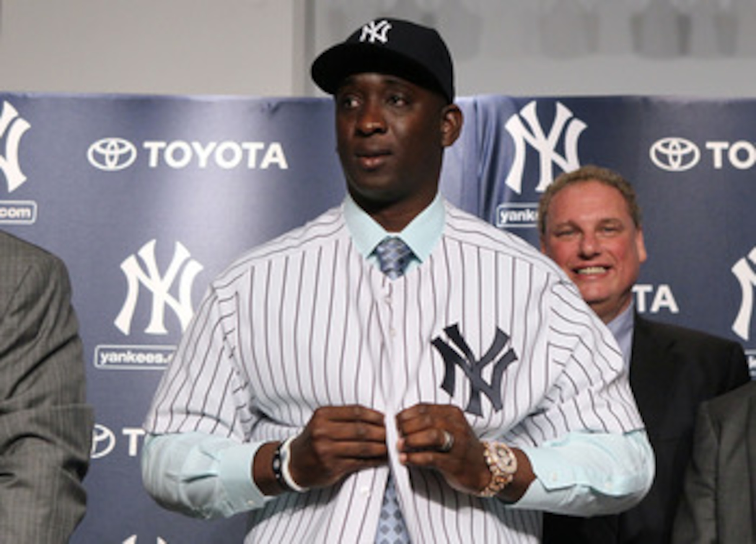NEW YORK, NY - JANUARY 19:  Rafael Soriano of the New York Yankees tries on his new uniform during his introduction press conference on January 19, 2011 at Yankee Stadium in the Bronx borough of New York City. The Yankees signed Soriano to a three-year co