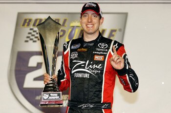 DARLINGTON, SC - MAY 06:  Kyle Busch, driver of the #18 Z-Line Designs Toyota, celebrates in Victory Lane after winning the NASCAR Nationwide Series Royal Purple 200 at Darlington Raceway on May 6, 2011 in Darlington, South Carolina.  (Photo by Chris Gray