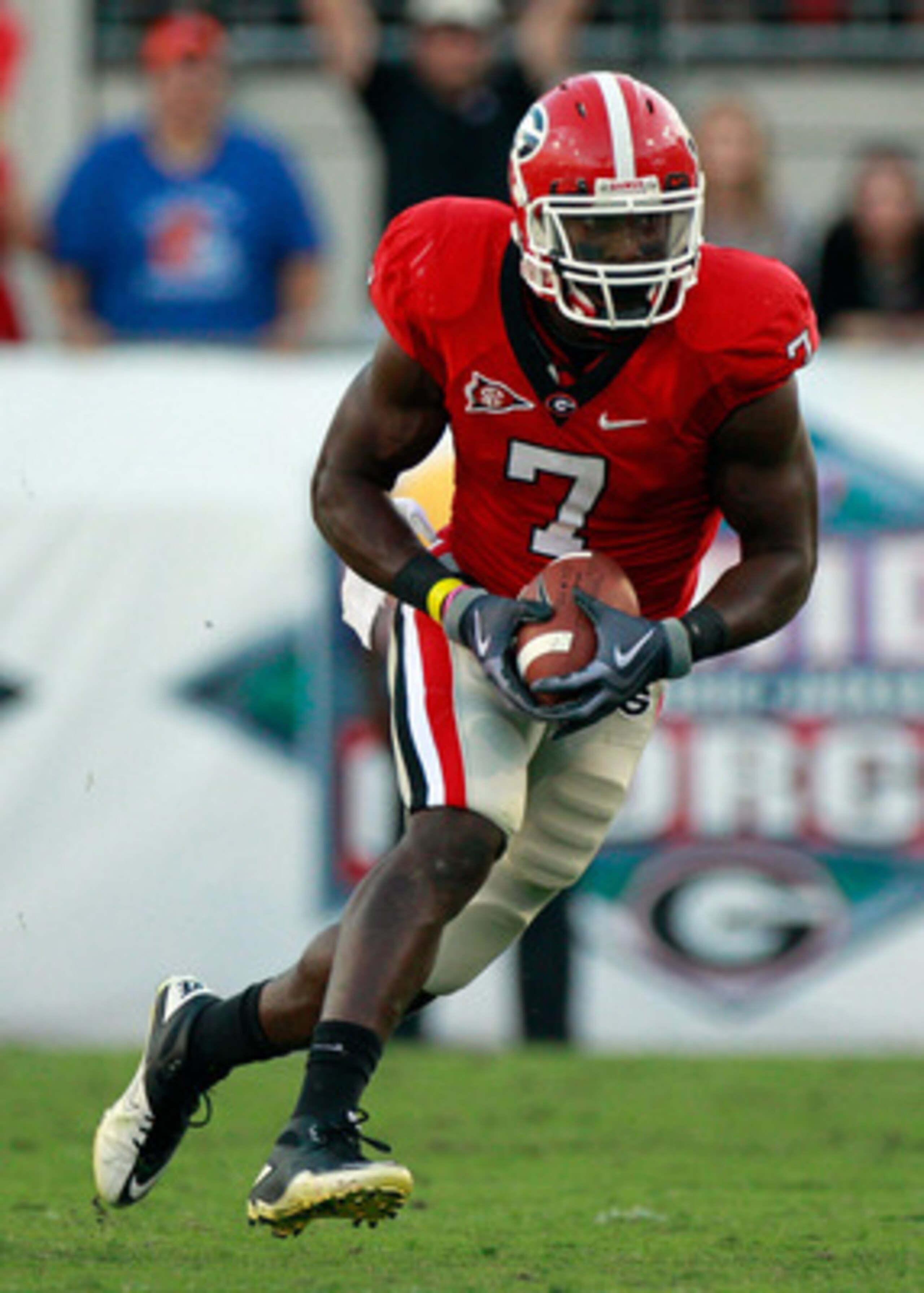 JACKSONVILLE, FL - OCTOBER 30:  Orson Charles #7 of the Georgia Bulldogs runs for yardage during the game against the Florida Gators at EverBank Field on October 30, 2010 in Jacksonville, Florida.  (Photo by Sam Greenwood/Getty Images)
