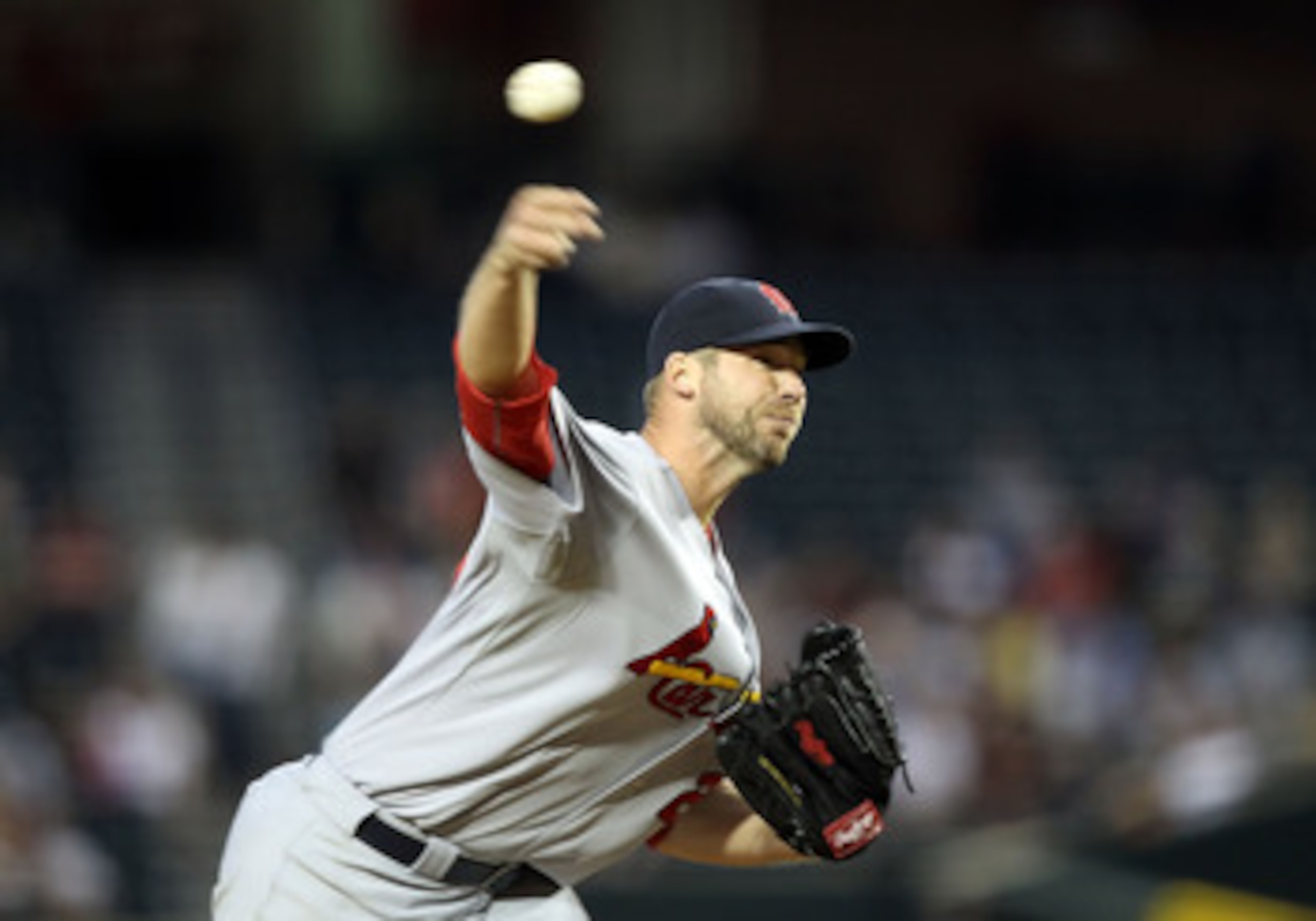 PHOENIX, AZ - APRIL 12:  Starting pitcher Chris Carpenter #29 of the St. Louis Cardinals pitches against the Arizona Diamondbacks during the Major League Baseball game at Chase Field on April 12, 2011 in Phoenix, Arizona.  (Photo by Christian Petersen/Get