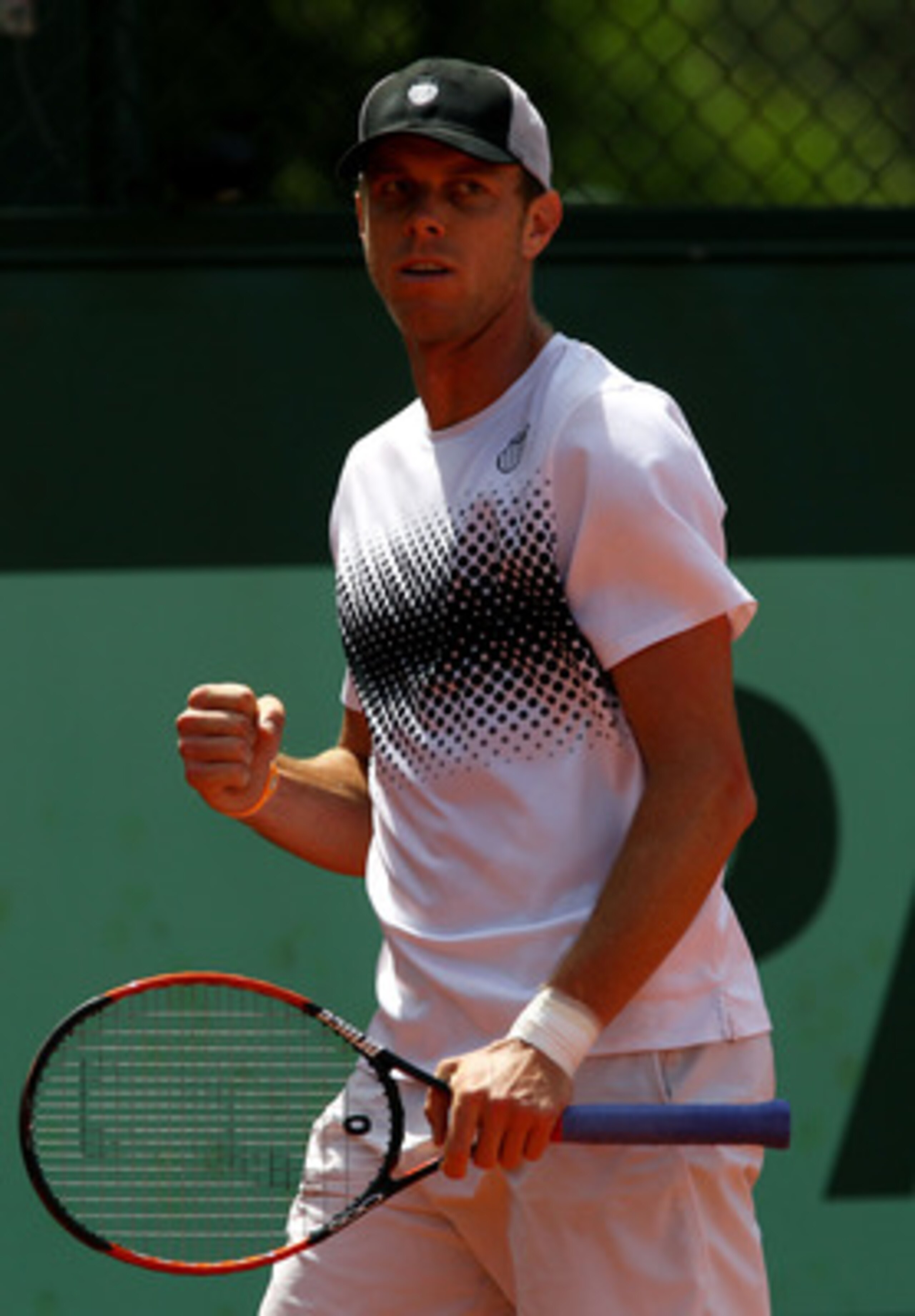 PARIS, FRANCE - MAY 24:  Sam Querrey of USA celebrates a point during the men's singles round one match between Sam Querrey of USA and Philipp Kohlschreiber of Germany on day three of the French Open at Roland Garros on May 24, 2011 in Paris, France.  (Ph
