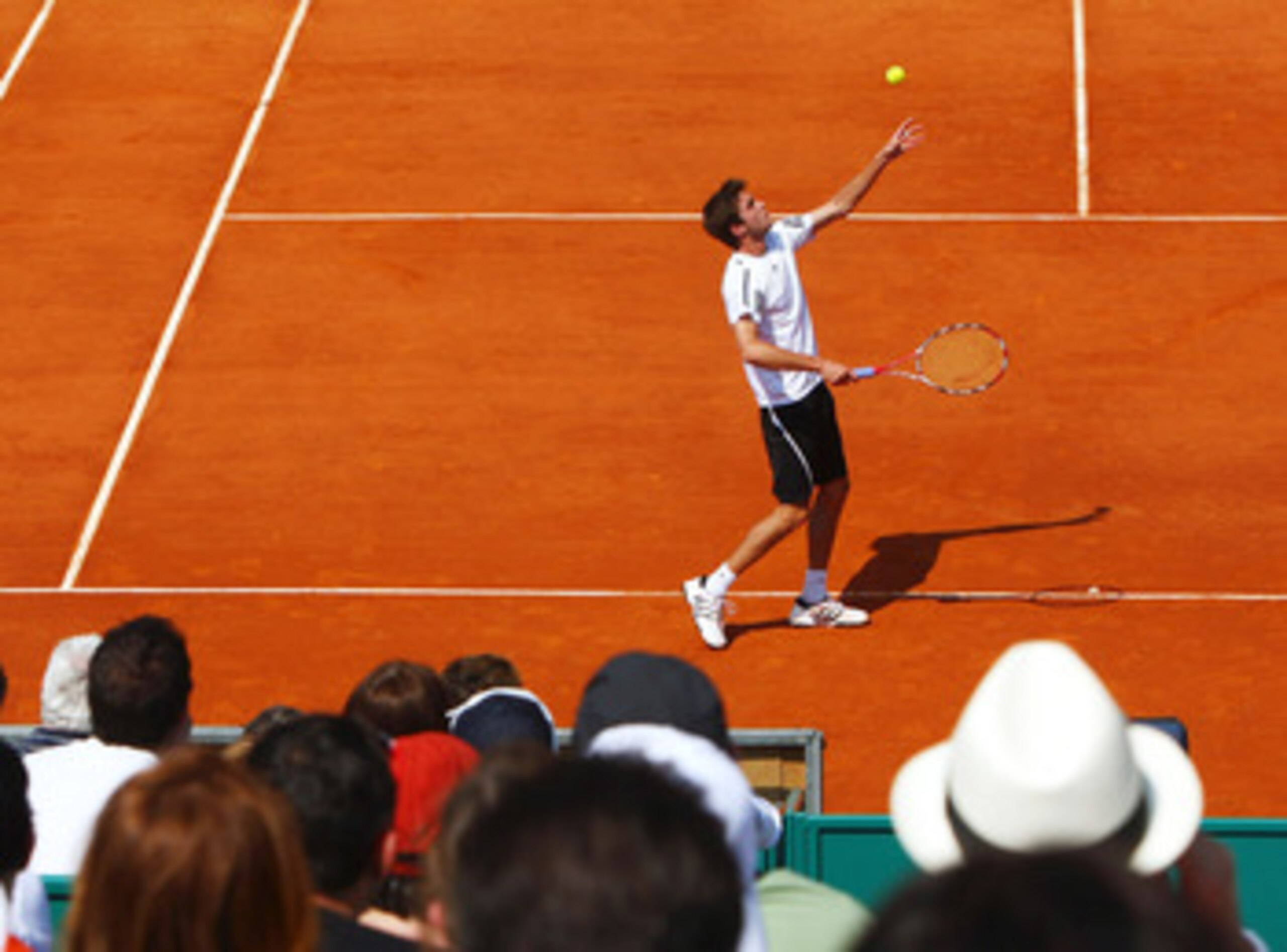MONTE CARLO, MONACO - APRIL 14:  Giles Simon of France serves during his defeat to Andreas Beck of Germany during day two of the ATP Masters Series at the Monte Carlo Country Club on April 14, 2009 in Monte Carlo,Monaco.  (Photo by Michael Steele/Getty Im