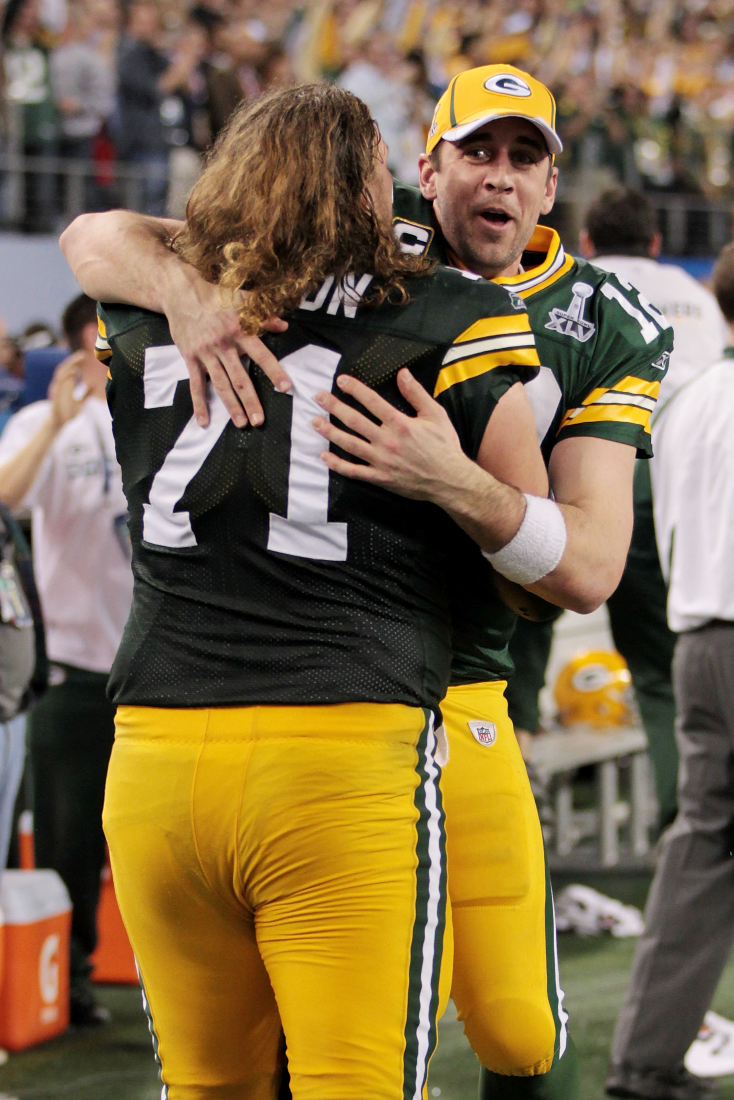 ARLINGTON, TX - FEBRUARY 06:  Aaron Rodgers #12 and Josh Sitton #71 of the Green Bay Packers celebrate after they defeated the Pittsburgh Steelers 31 to 25 in Super Bowl XLV at Cowboys Stadium on February 6, 2011 in Arlington, Texas.  (Photo by Jamie Squi