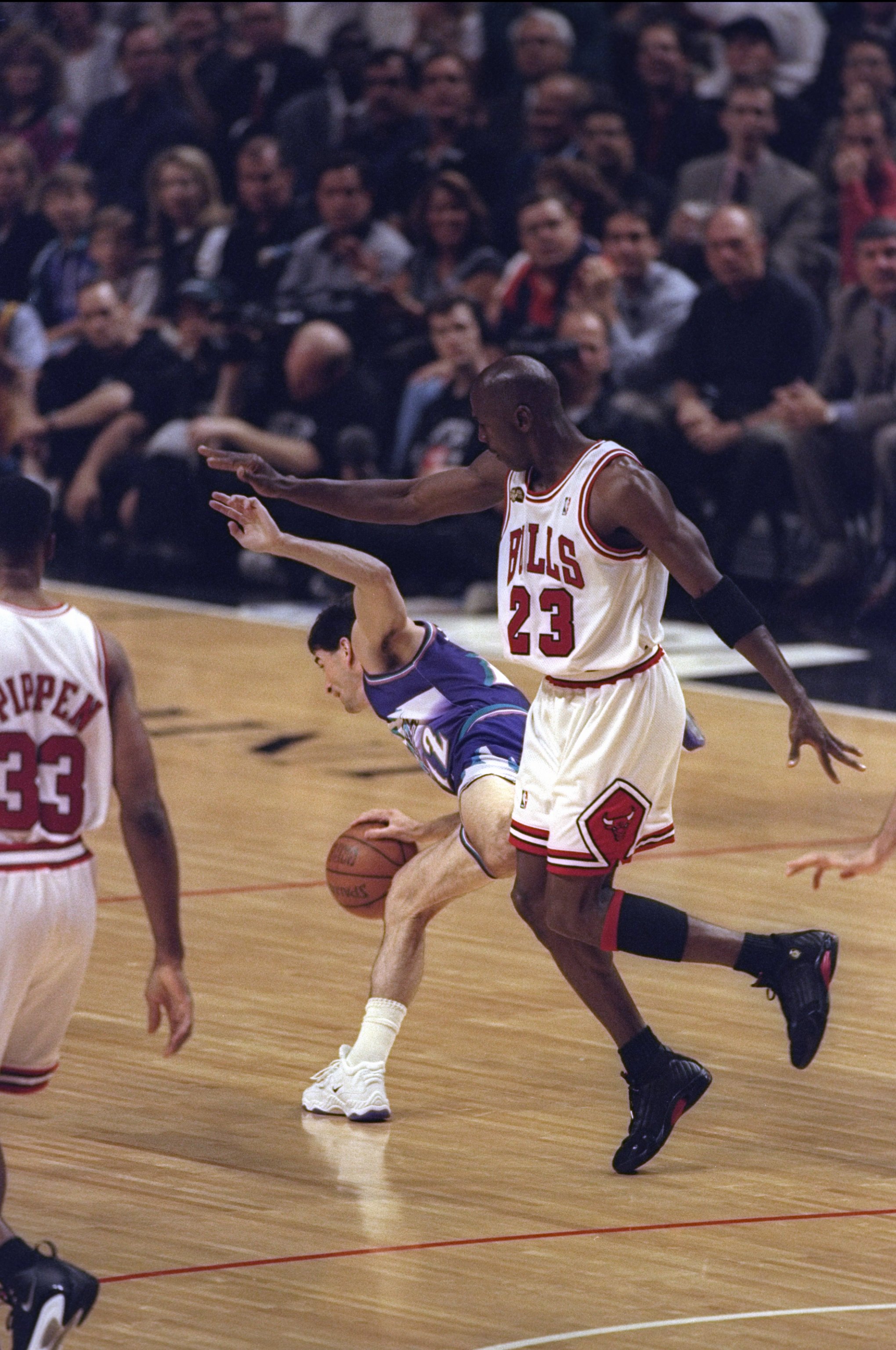 10 Jun 1998:  Michael Jordan #23 the Chicago Bulls in action against John Stockton of the Utah Jazz during the NBA Finals Game 4 at the United Center in Chicago, Illinois.  The Bulls defeated the Jazz 86-82. Mandatory Credit: Jonathan Daniel  /Allsport