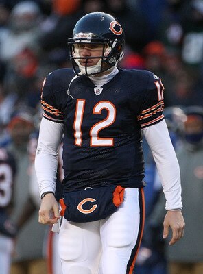 CHICAGO, IL - JANUARY 23:  Quarterback Caleb Hanie #12 of the Chicago Bears looks on while taking on the Green Bay Packers in the NFC Championship Game at Soldier Field on January 23, 2011 in Chicago, Illinois.  (Photo by Doug Pensinger/Getty Images)