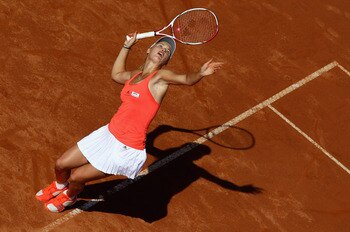 ROME, ITALY - MAY 14:  Caroline Wozniacki of Denmark serves during her semi final match against Maria Sharapova of Russia during day seven of the Internazoinali BNL D'Italia at the Foro Italico Tennis Centre  on May 14, 2011 in Rome, Italy.  (Photo by Cli