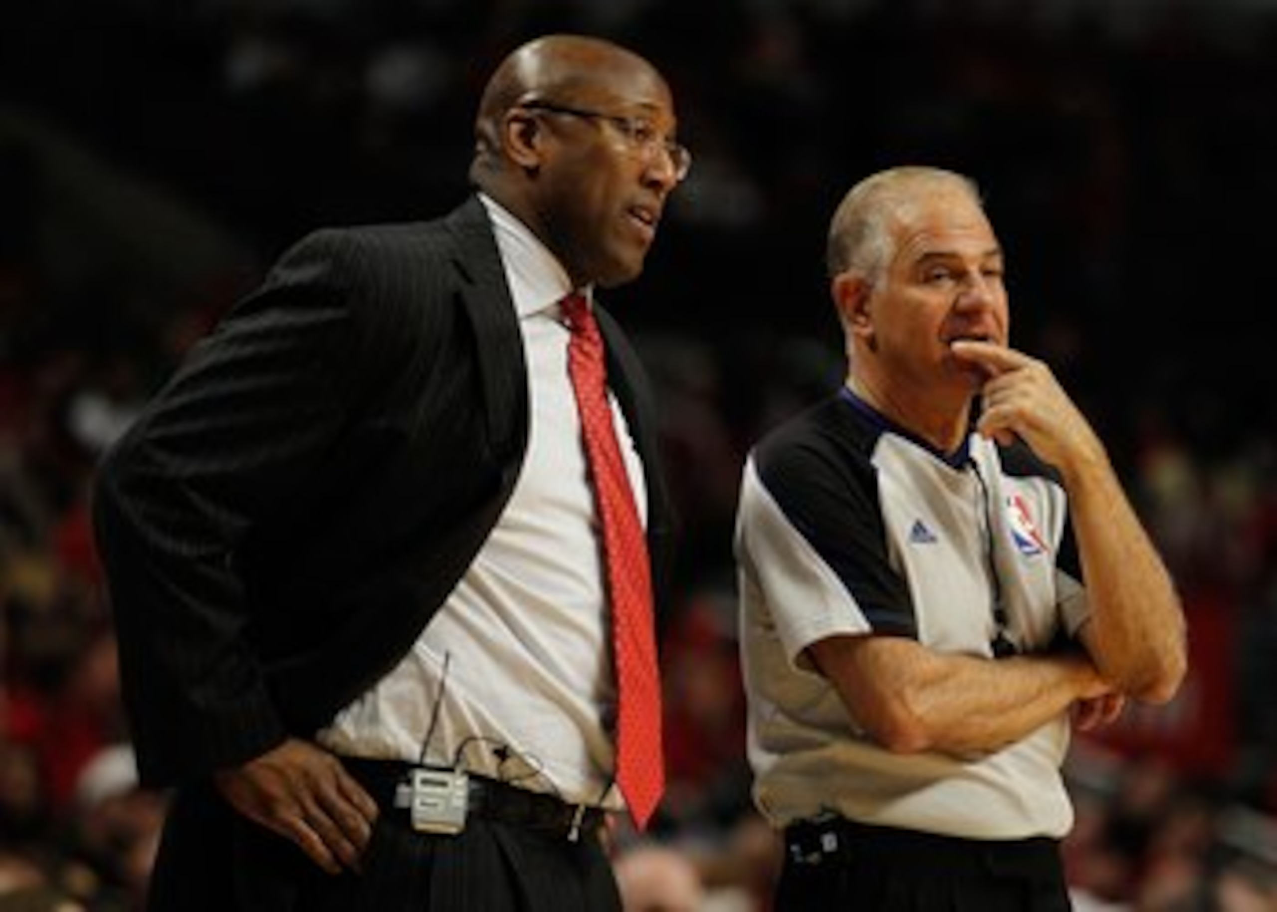 CHICAGO - APRIL 25: Head coach Mike Brown of the Cleveland Cavaliers talks with referee Bennett Salvatore #15 as a member of the Chicago Bulls shoots a free-throw in Game Four of the Eastern Conference Quarterfinals during the 2010 NBA Playoffs at the Uni