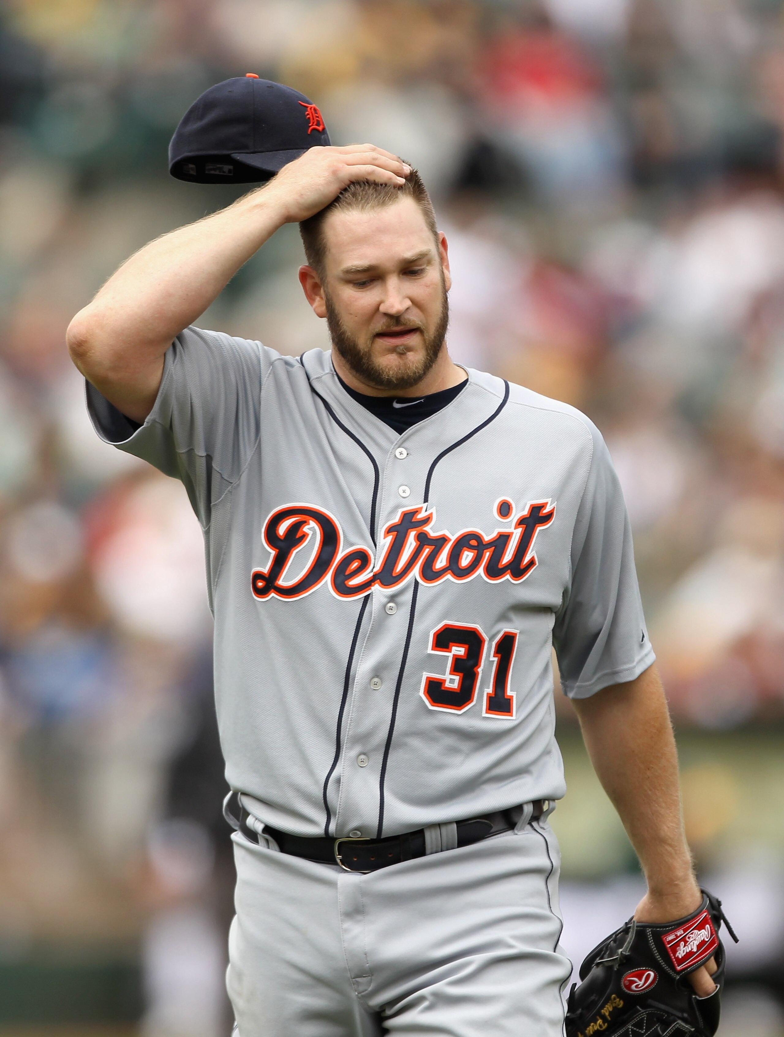 OAKLAND, CA - APRIL 17:  Brad Penny #31 of the Detroit Tigers walks off the field after the fifth inning in which he gave up three runs to the Oakland Athletics  at Oakland-Alameda County Coliseum on April 17, 2011 in Oakland, California.  (Photo by Ezra