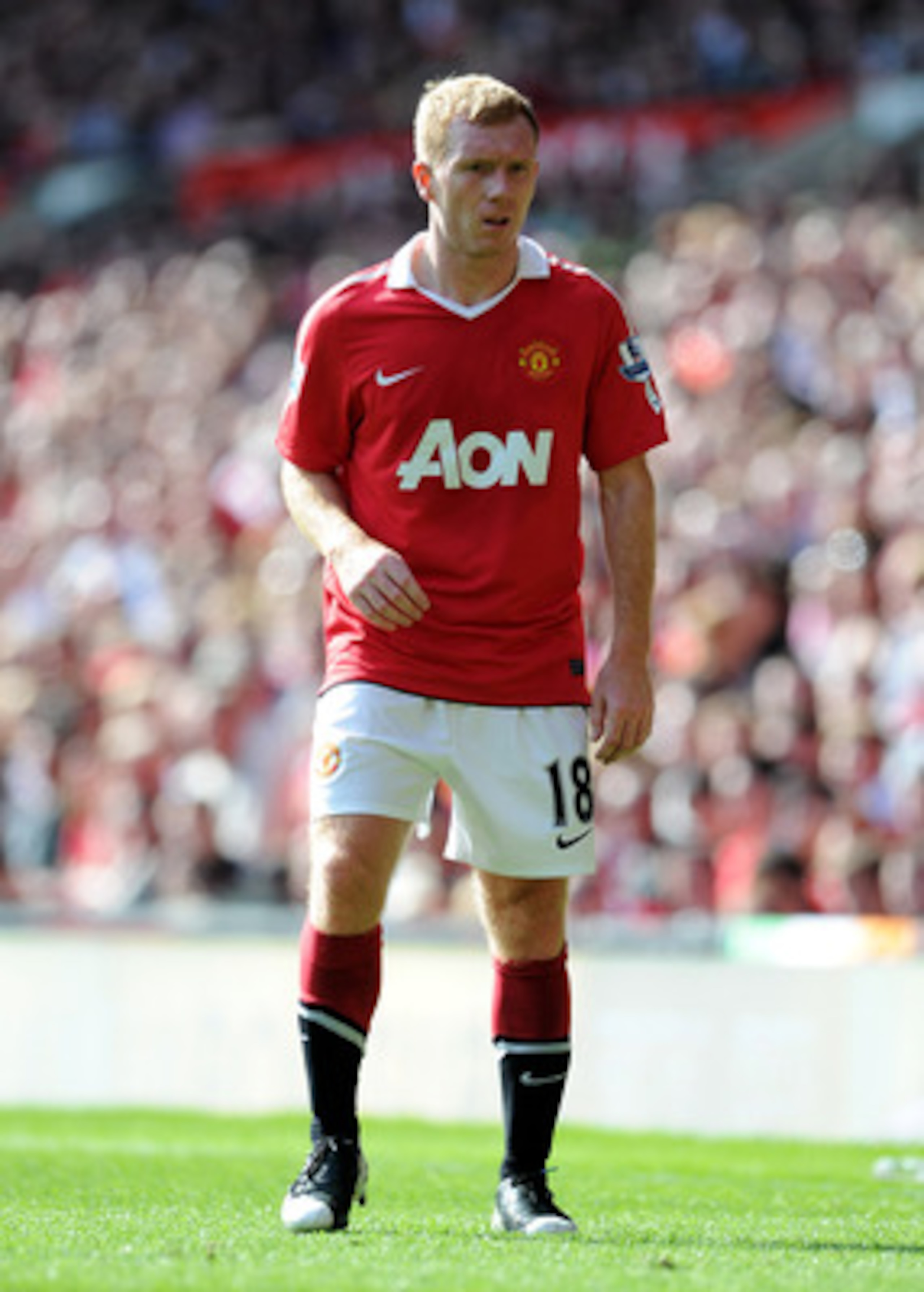 MANCHESTER, ENGLAND - APRIL 09: Paul Scholes of Manchester United looks on during the Barclays Premier League match between Manchester United and Fulham at Old Trafford on April 9, 2011 in Manchester, England.  (Photo by Michael Regan/Getty Images)