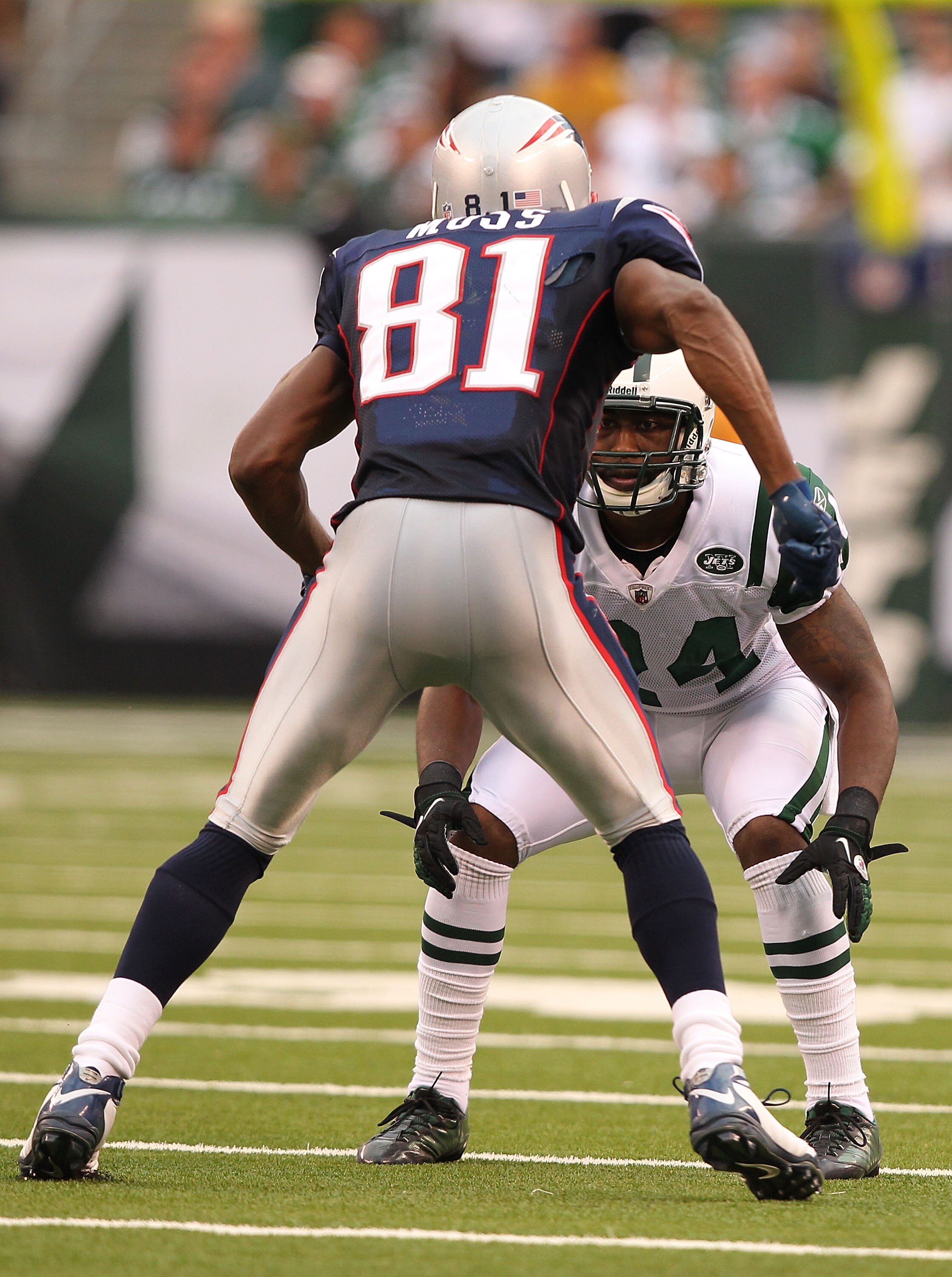 EAST RUTHERFORD, NJ - SEPTEMBER 19:  Darrelle Revis #24 of the New York Jets defends against Randy Moss #81 of the New England Patriots during their  game on September 19, 2010 at the New Meadowlands Stadium  in East Rutherford, New Jersey.  (Photo by Al