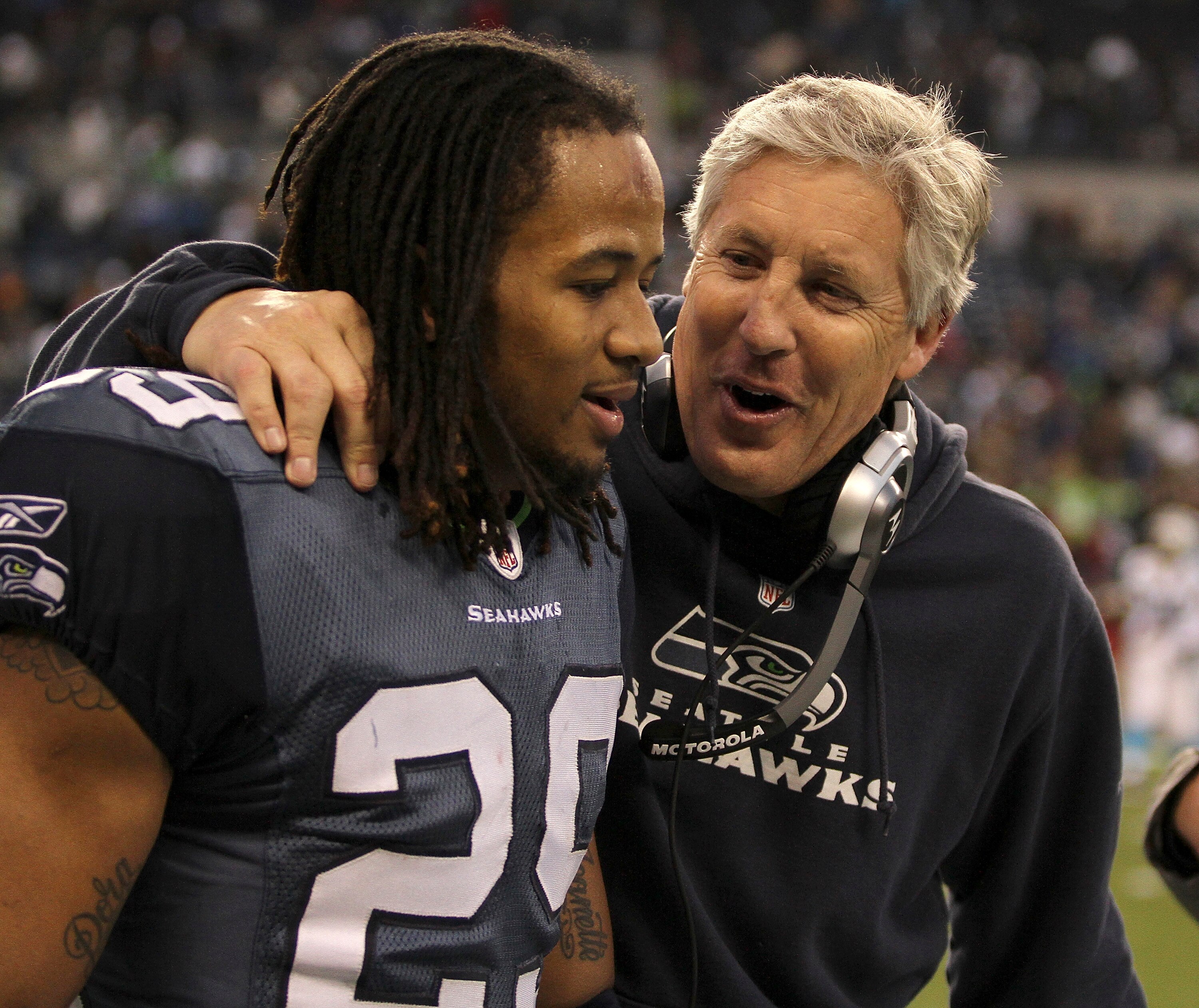 SEATTLE, WA - DECEMBER 05:  Head coach Pete Carroll of the Seattle Seahawks congratulates free safety Earl Thomas #29 near the end of the game against the Carolina Panthers at Qwest Field on December 5, 2010 in Seattle, Washington. The Seahawks defeated t