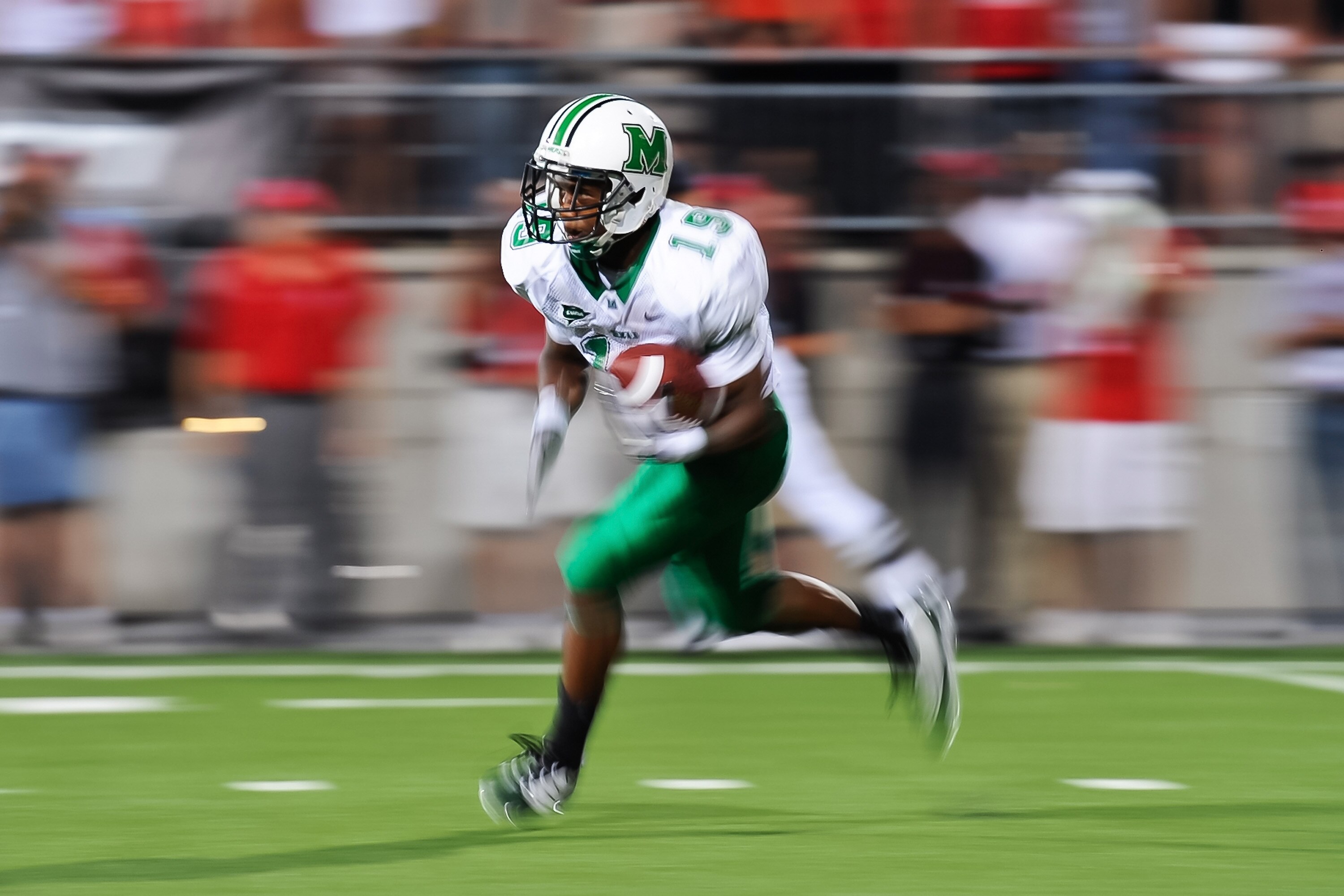 COLUMBUS, OH - SEPTEMBER 2: Andre Booker #19 of the Marshall Thundering Herd runs with the ball against the Ohio State Buckeyes at Ohio Stadium on September 2, 2010 in Columbus, Ohio. (Photo by Jamie Sabau/Getty Images)