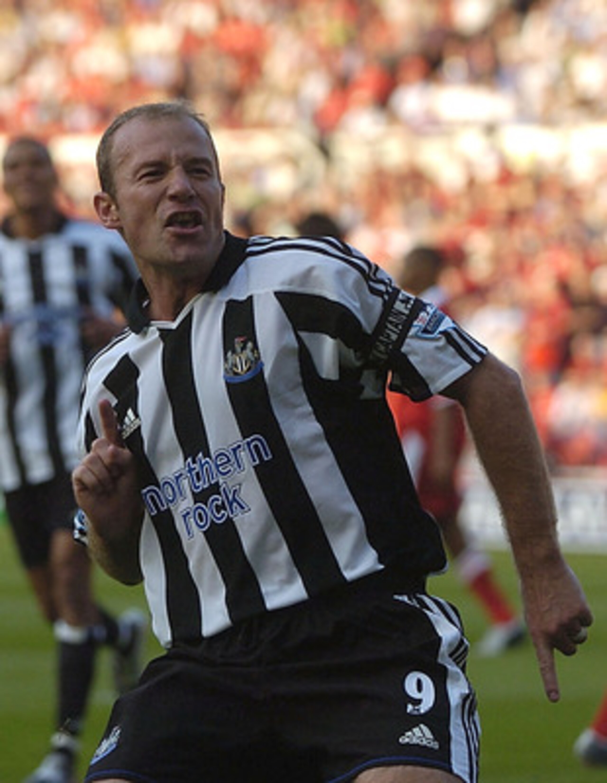 MIDDLESBROUGH, ENGLAND - AUGUST 14:  Alan Shearer of Newcastle celebrates after scoring the second goal with a penalty during the Barclays Premiership match between Middlesbrough and Newcastle United at the Riverside Stadium on August 14, 2004 in Middlesb
