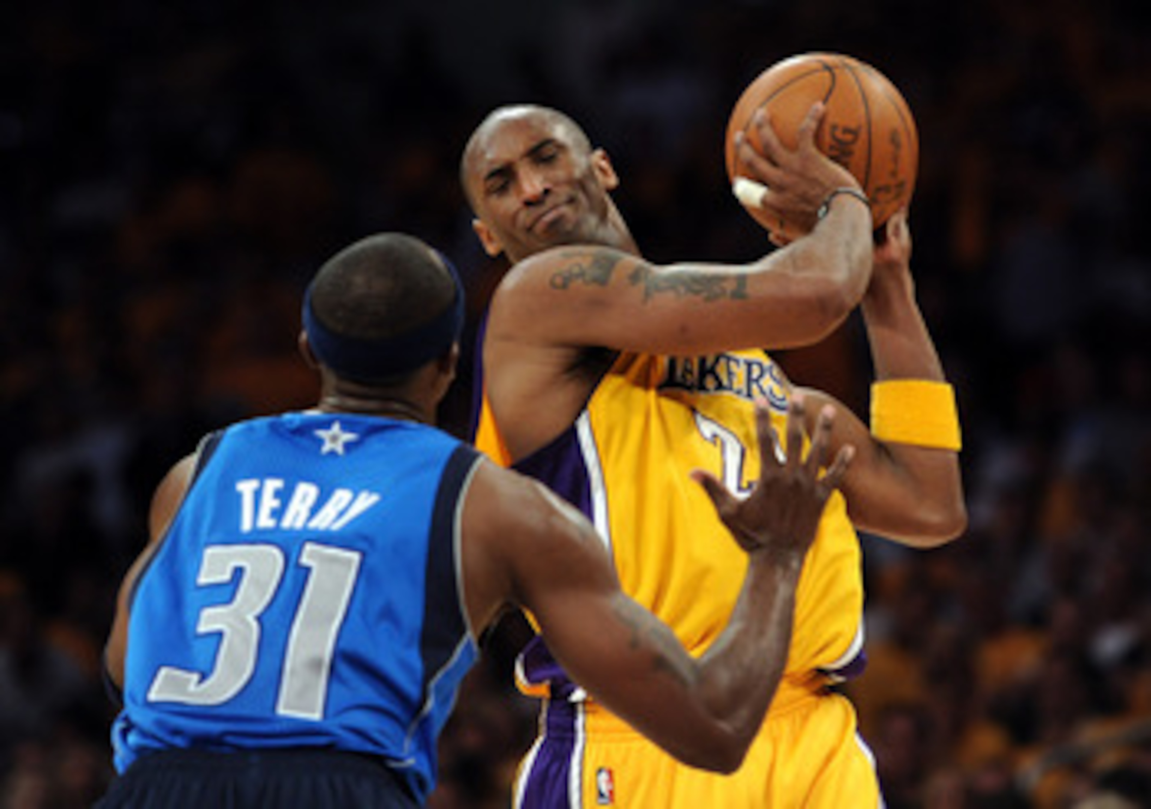 LOS ANGELES, CA - MAY 02:  Kobe Bryant #24 of the Los Angeles Lakers moves the ball as he is guarded by Jason Terry #31 of the Dallas Mavericks in Game One of the Western Conference Semifinals in the 2011 NBA Playoffs at Staples Center on May 2, 2011 in L