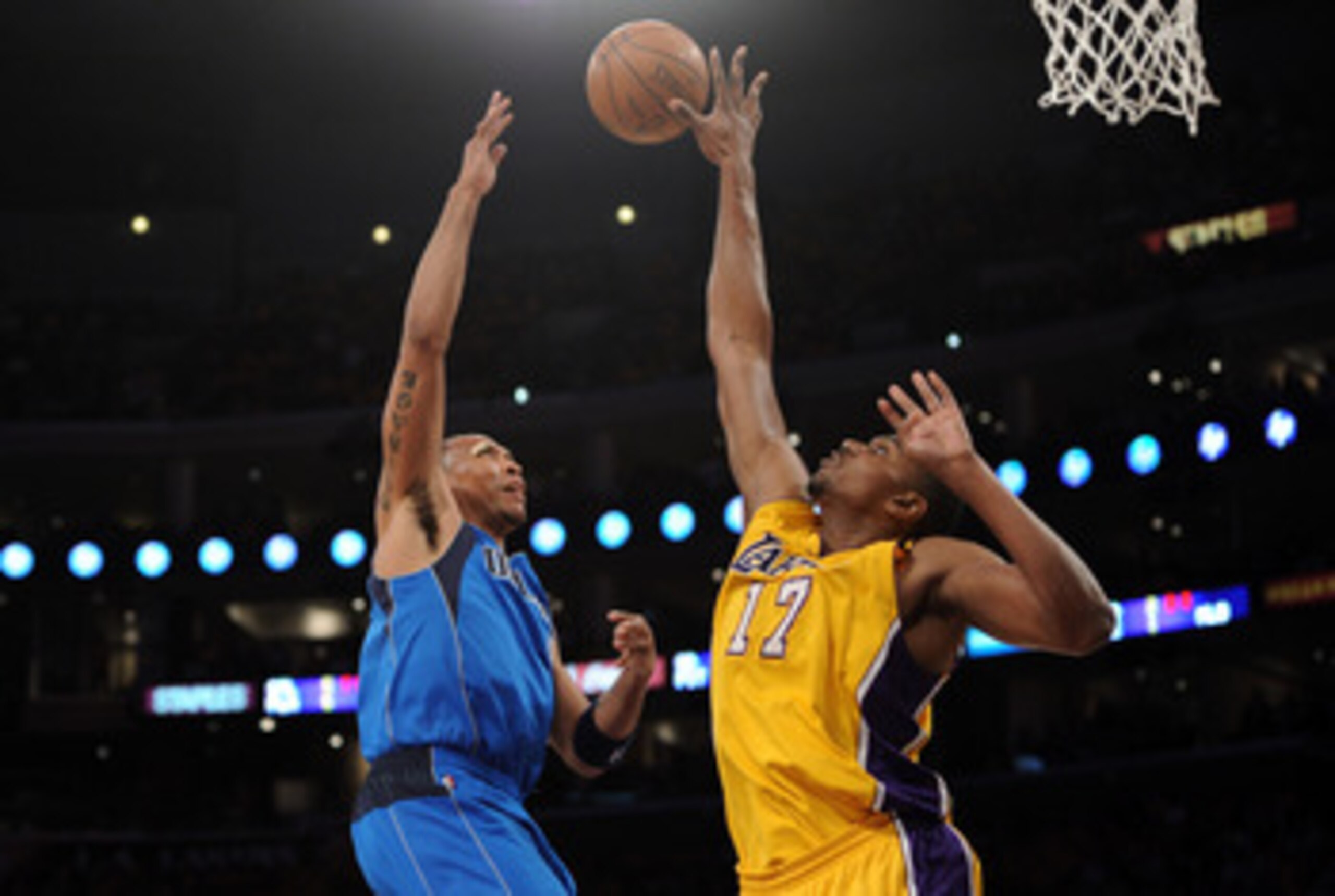 LOS ANGELES, CA - MAY 02: Shawn Marion #0 of the Dallas Mavericks goes up for a shot over Andrew Bynum #17 of the Los Angeles Lakers in the first quarter in Game One of the Western Conference Semifinals in the 2011 NBA Playoffs at Staples Center on May 2 LOS ANGELES, CA - MAY 02: Shawn Marion #0 of the Dallas Mavericks goes up for a shot over Andrew Bynum #17 of the Los Angeles Lakers in the first quarter in Game One of the Western Conference Semifinals in the 2011 NBA Playoffs at Staples Center on May 2