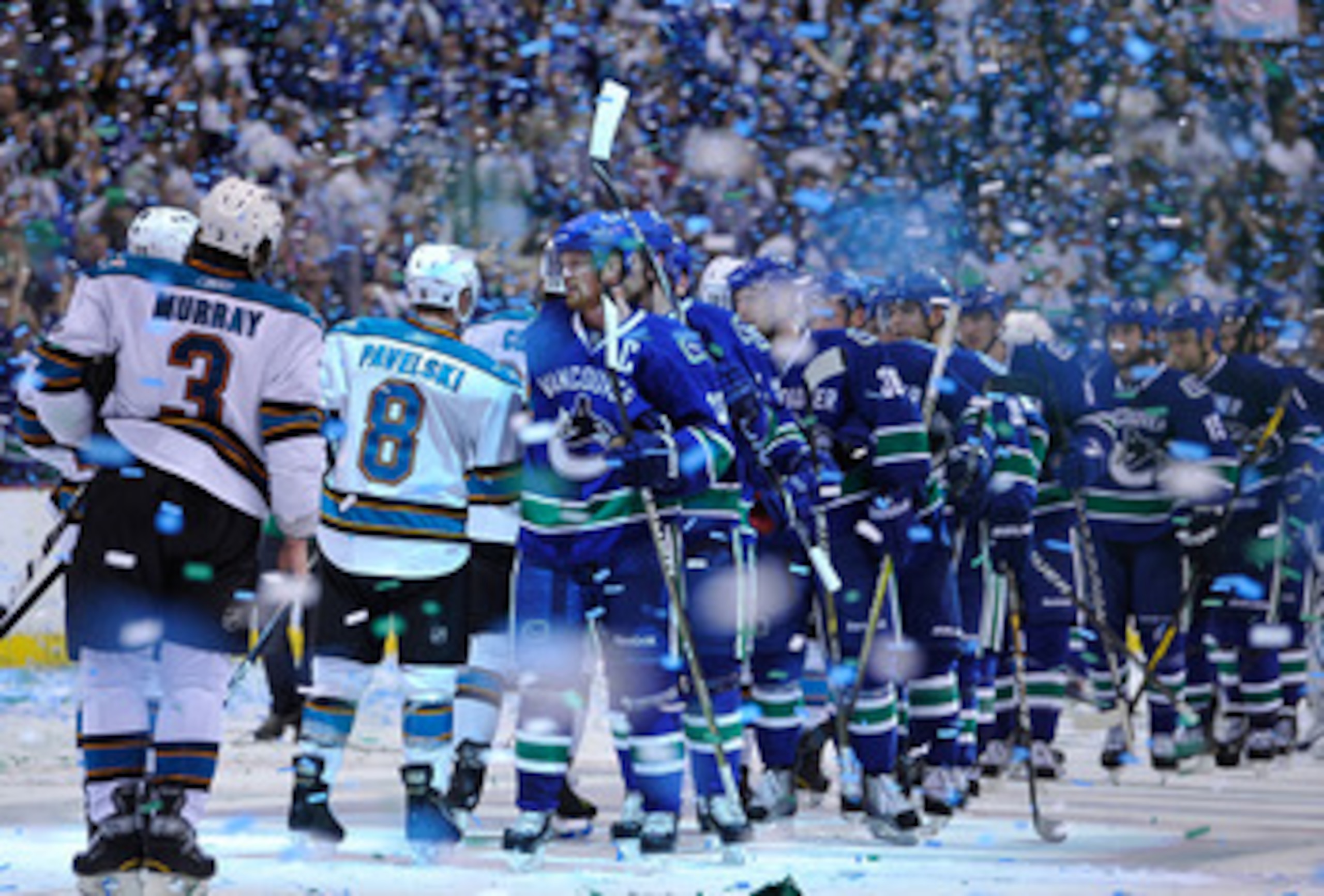 VANCOUVER, CANADA - MAY 24: Captain Henrik Sedin #33 of the Vancouver Canucks leads his team for the post game handshake with the San Jose Sharks after winning Game Five of the Western Conference Finals 3-2 in the second overtime during the 2011 Stanley VANCOUVER, CANADA - MAY 24: Captain Henrik Sedin #33 of the Vancouver Canucks leads his team for the post game handshake with the San Jose Sharks after winning Game Five of the Western Conference Finals 3-2 in the second overtime during the 2011 Stanley