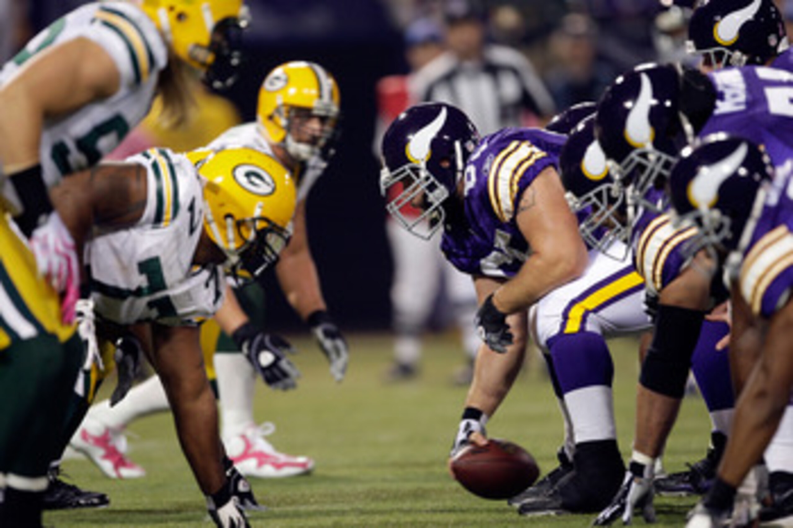 MINNEAPOLIS - OCTOBER 05:  Center John Sullivan #65 and the Minnesota Vikings line up during the game against the Green Bay Packers on October 5, 2009 at Hubert H. Humphrey Metrodome in Minneapolis, Minnesota.  (Photo by Jamie Squire/Getty Images)