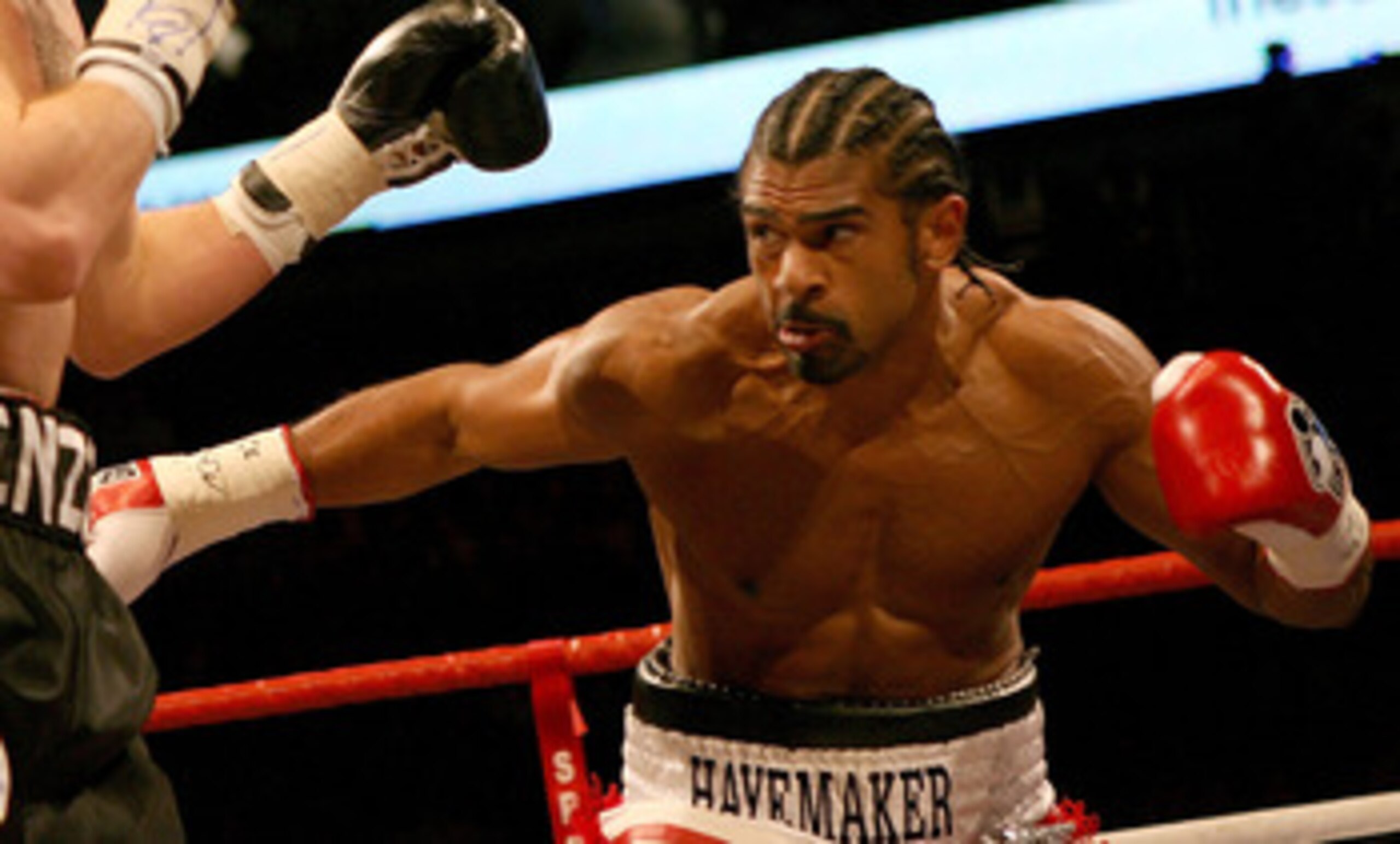 LONDON, ENGLAND - MARCH 9:   David Haye (R) exchanges punches with Enzo Maccarinelli during the Unified World Cruiserweight title at the O2 Arena March 9, 2008 in London, England. Haye won by a knockout in the second-round.  (Photo by John Gichigi/Getty I