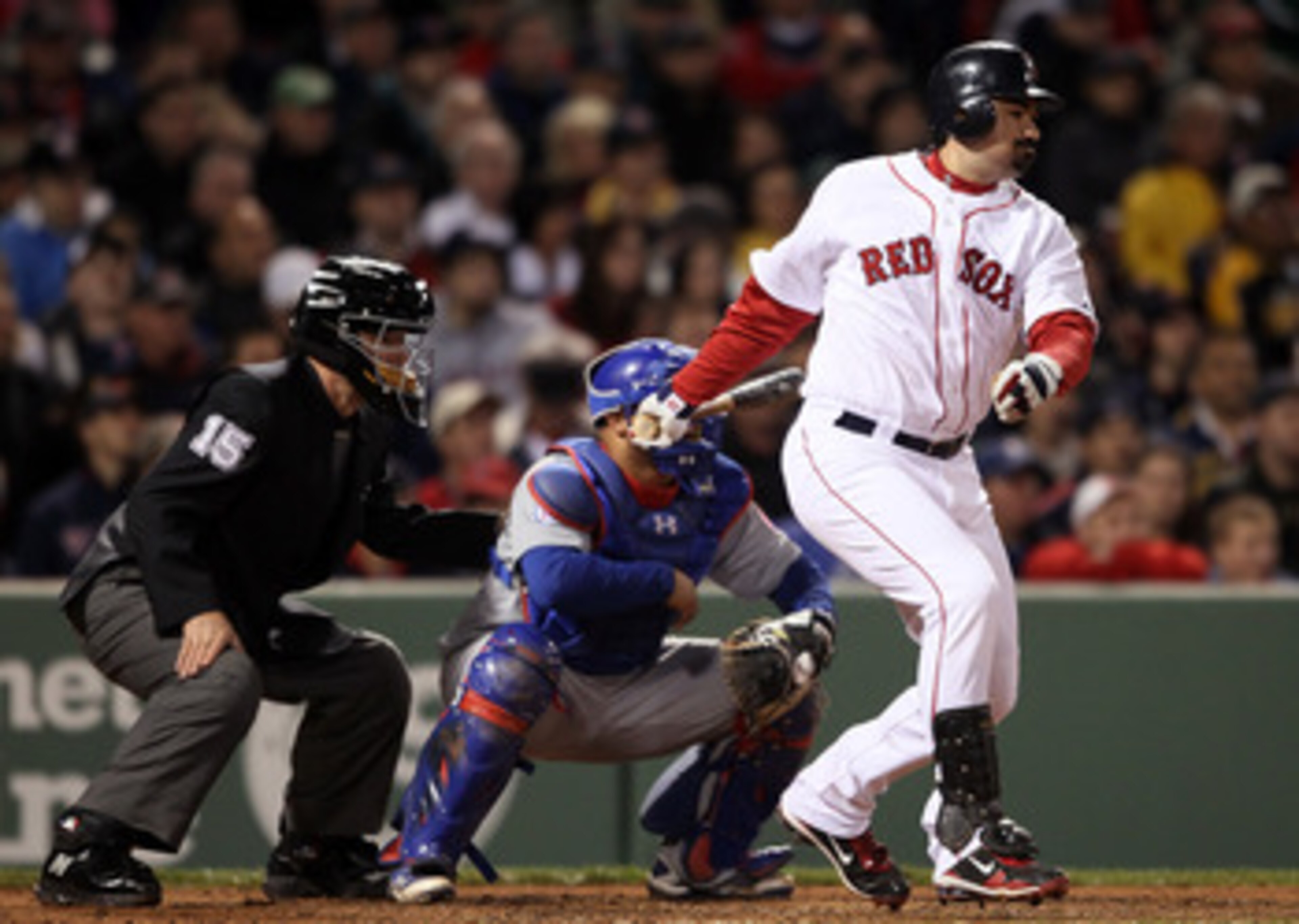 BOSTON, MA - MAY 22: Adrian Gonzalez #28 of the Boston Red Sox hits a single as Welington Castillo #53 of the Chicago Cubs catches on May 22, 2011 at Fenway Park in Boston, Massachusetts. Before this series, the two teams haven't played at Fenway Park s BOSTON, MA - MAY 22: Adrian Gonzalez #28 of the Boston Red Sox hits a single as Welington Castillo #53 of the Chicago Cubs catches on May 22, 2011 at Fenway Park in Boston, Massachusetts. Before this series, the two teams haven't played at Fenway Park s