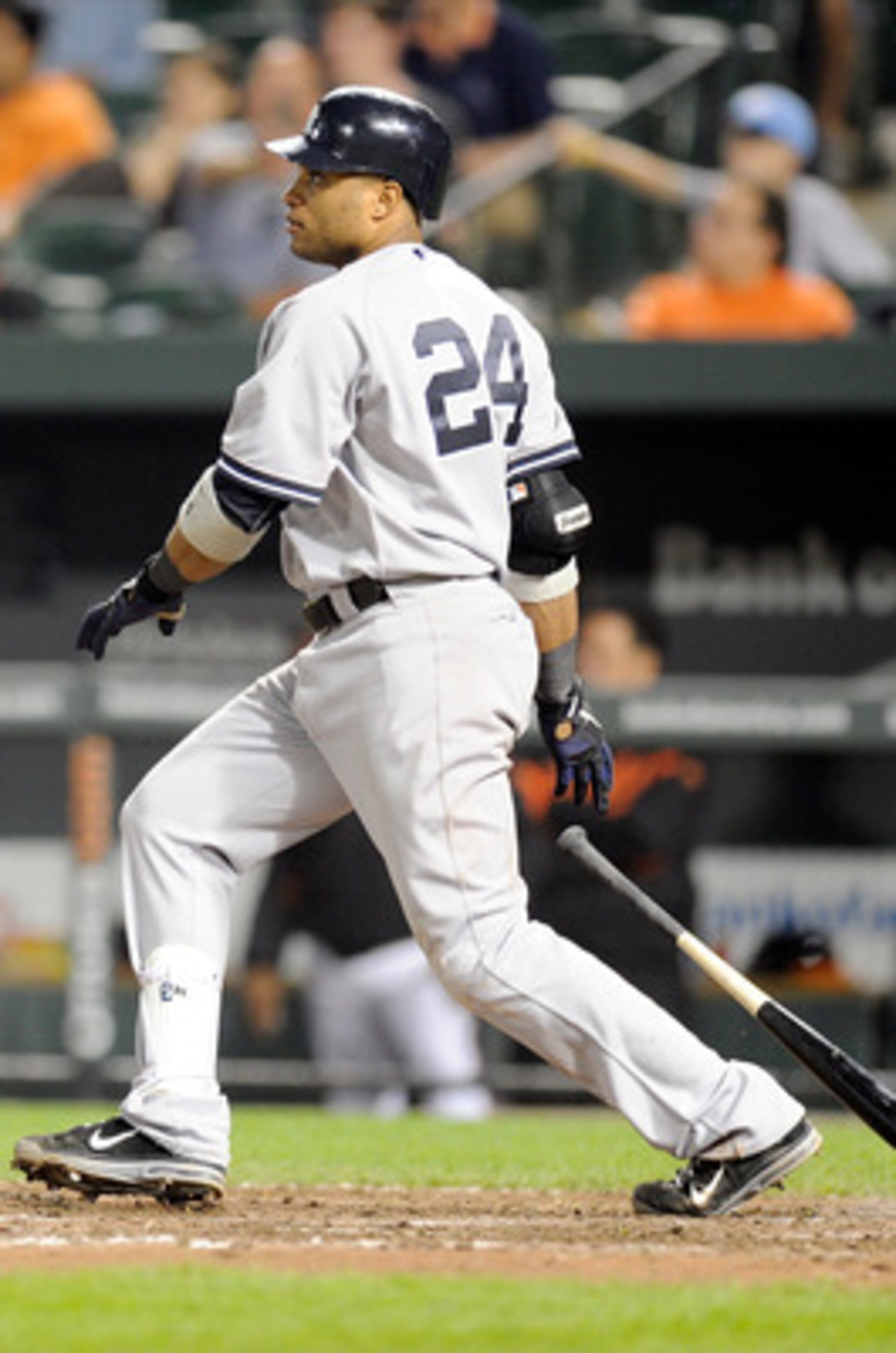BALTIMORE, MD - MAY 18:  Robinson Cano #24 of the New York Yankees doubles in the winning runs in the fifteenth inning against the Baltimore Orioles at Oriole Park at Camden Yards on May 18, 2011 in Baltimore, Maryland. New York won the game 4-1.  (Photo 