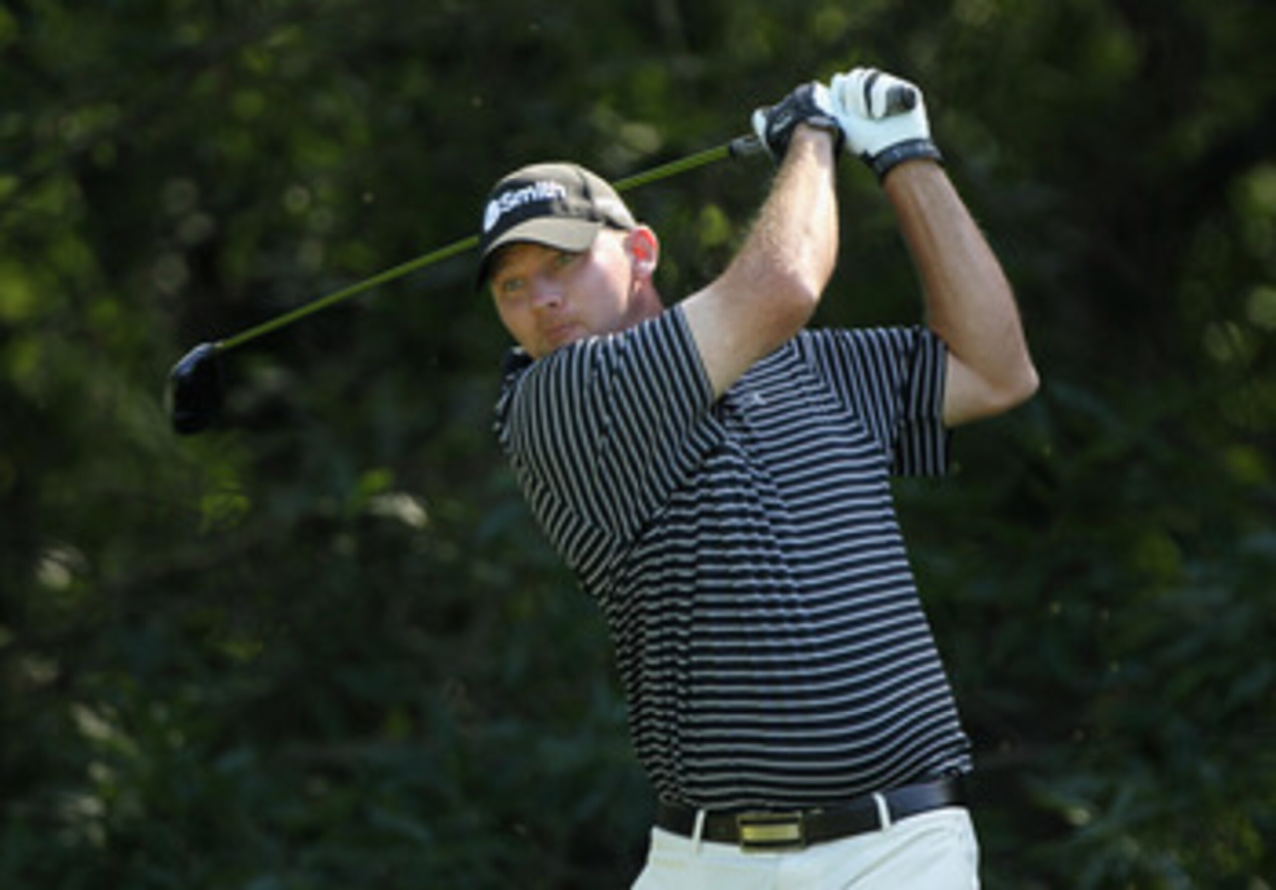 CHARLOTTE, NC - MAY 05:  Tommy Gainey watches his tee shot on the 12th hole during the first round of the Wells Fargo Championship at the Quail Hollow Club on May 5, 2011 in Charlotte, North Carolina.  (Photo by Scott Halleran/Getty Images)
