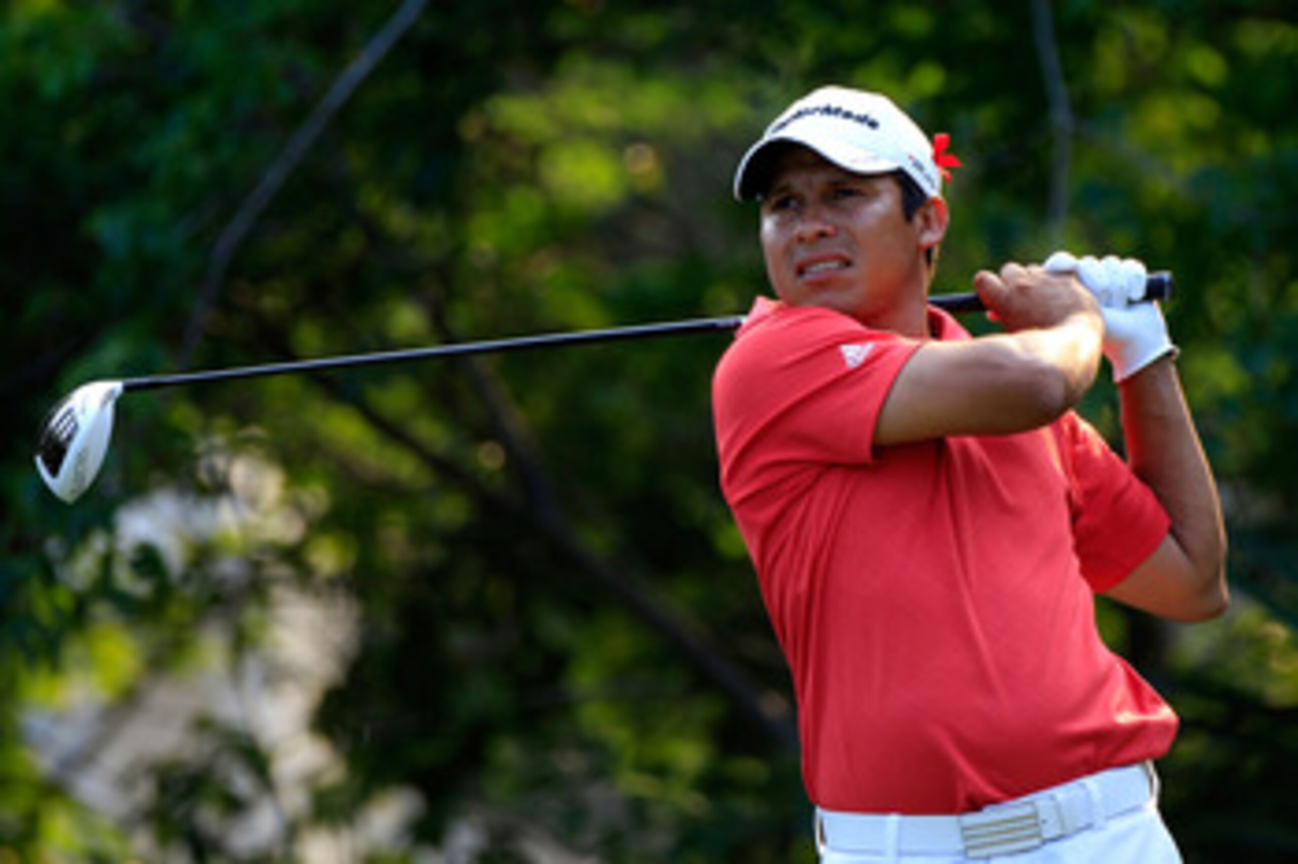 PONTE VEDRA BEACH, FL - MAY 12:  Andres Romero of Argentina hits his tee shot on the fifth hole during the first round of THE PLAYERS Championship held at THE PLAYERS Stadium course at TPC Sawgrass on May 12, 2011 in Ponte Vedra Beach, Florida.  (Photo by