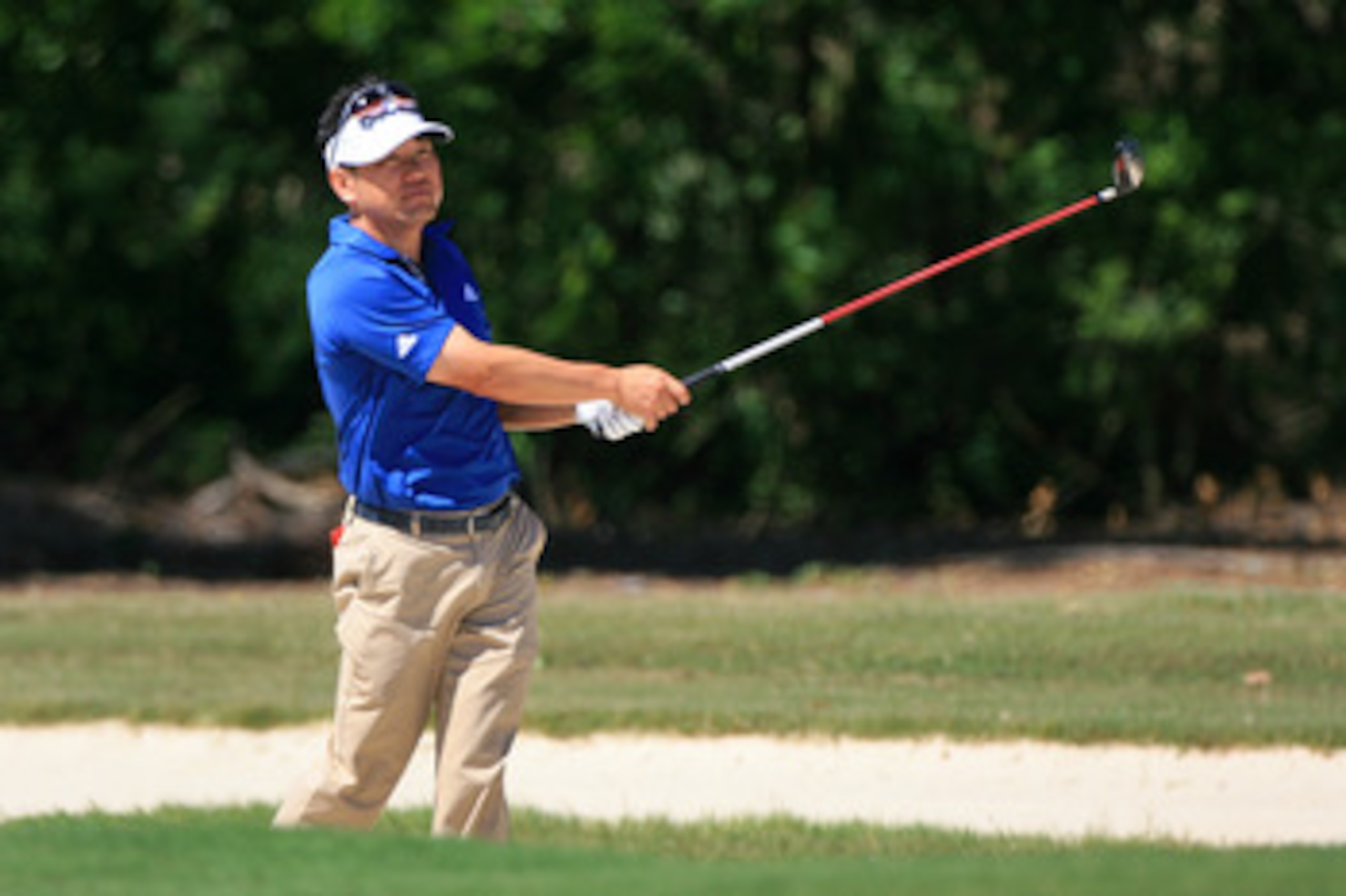NEW ORLEANS, LA - APRIL 28 : Charlie Wi of South Korea hits his second shot on the 15th hole during the first round of the Zurich Classic at the TPC Louisiana on April 28, 2011 in New Orleans, Louisiana. (Photo by Hunter Martin/Getty Images)