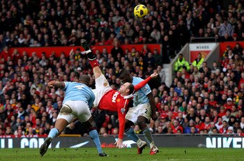 MANCHESTER, ENGLAND - FEBRUARY 12:  Wayne Rooney of Manchester United scores a goal from an overhead kick during the Barclays Premier League match between Manchester United and Manchester City at Old Trafford on February 12, 2011 in Manchester, England.